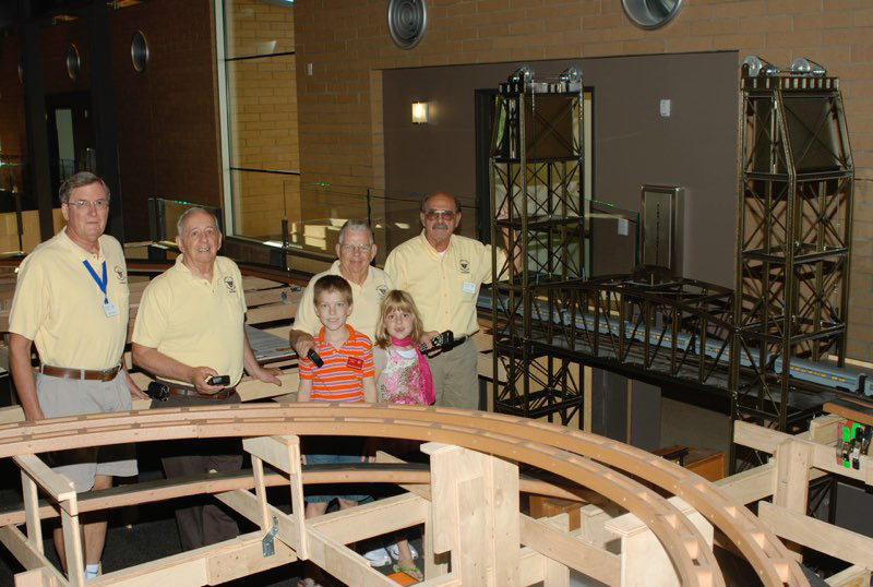 Russ Mosser, Paul Boston, Bob Cowles (with grandchildren Christopher and Grace), and Bill Rodgers.