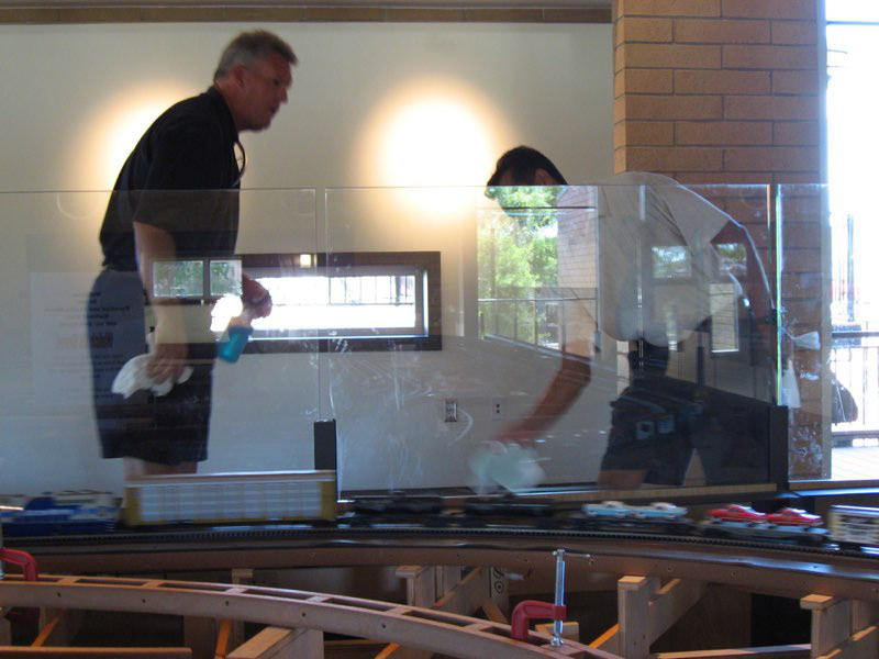 Sunday morning and Bob McNair, head of the park, and Henry Garcia second in command clean windows.