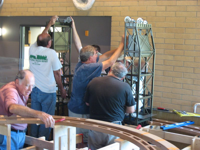 It’s up and over the pulleys for the lift cables. Tall guys rule here. (Bill is on a ladder ... cheater!)