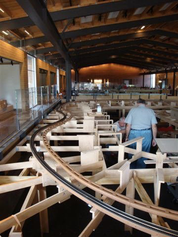 The long view with O gauge closest, then N gauge, and at the other end the HO gauge layouts.