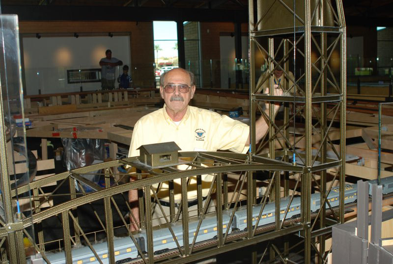 Bill Rodgers mans the lift bridge as a passenger consist roars by.
