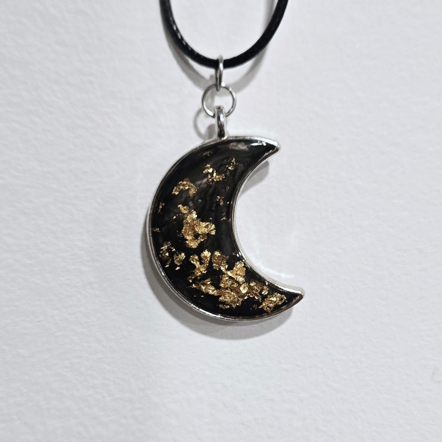 1. gold leaf on black moon, silver frame