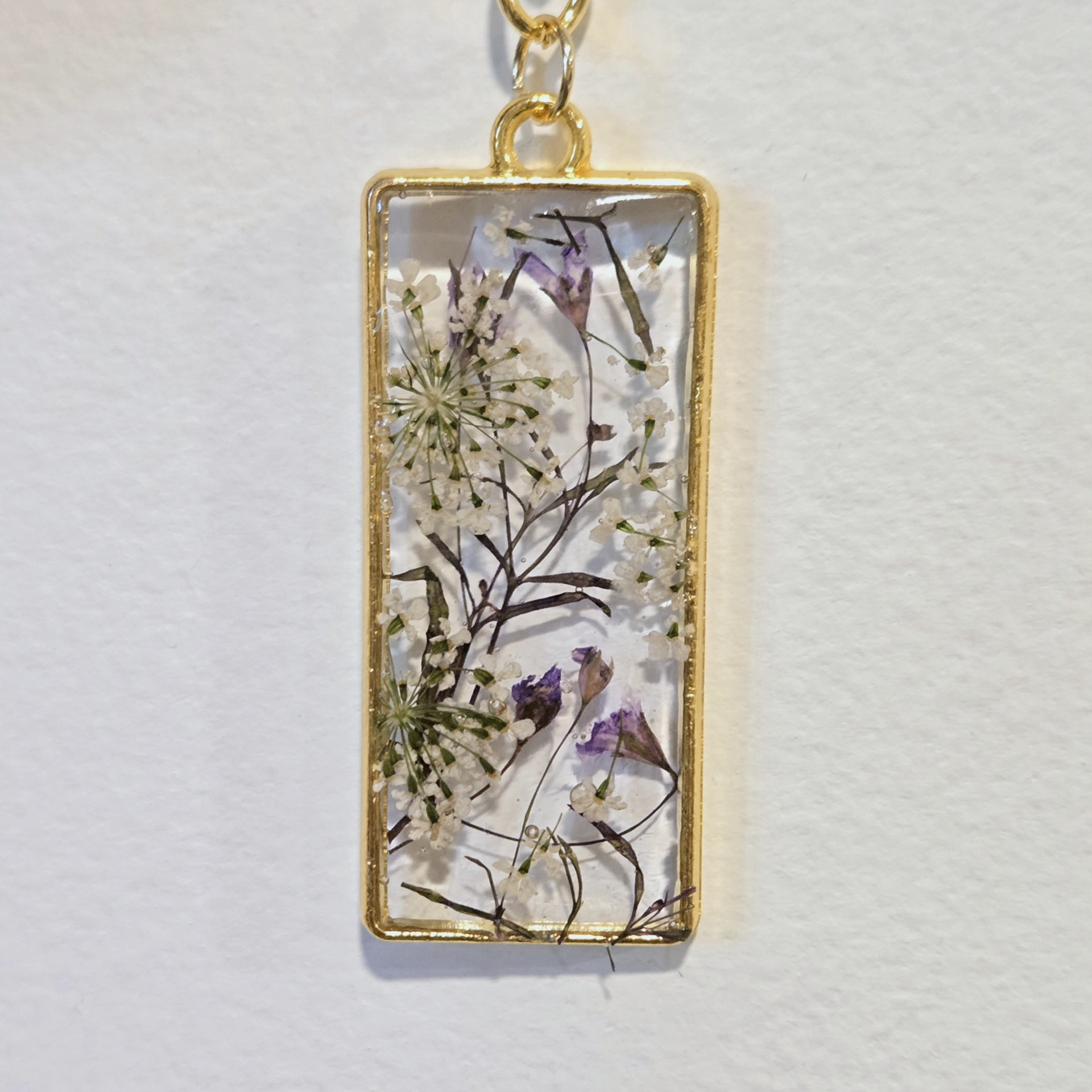12. flower mix in clear rectangle, gold frame