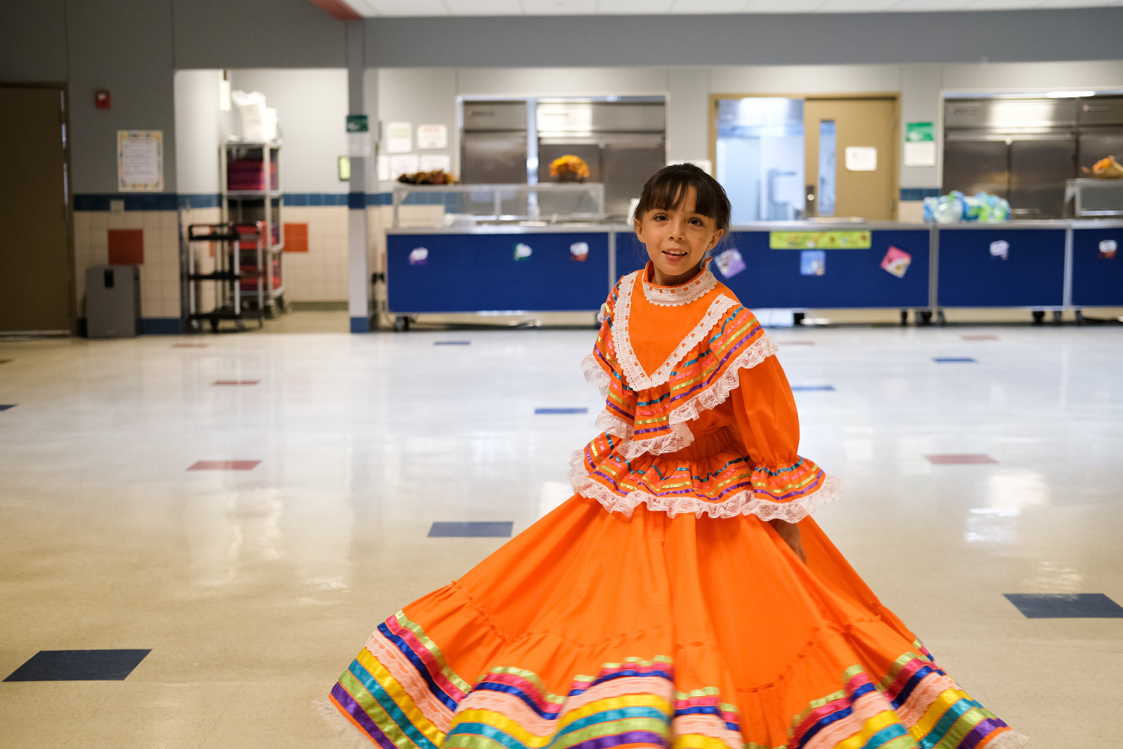 A girl who live in Palomas, Chihuahua performs at her elementary school. Columbus, New Mexico