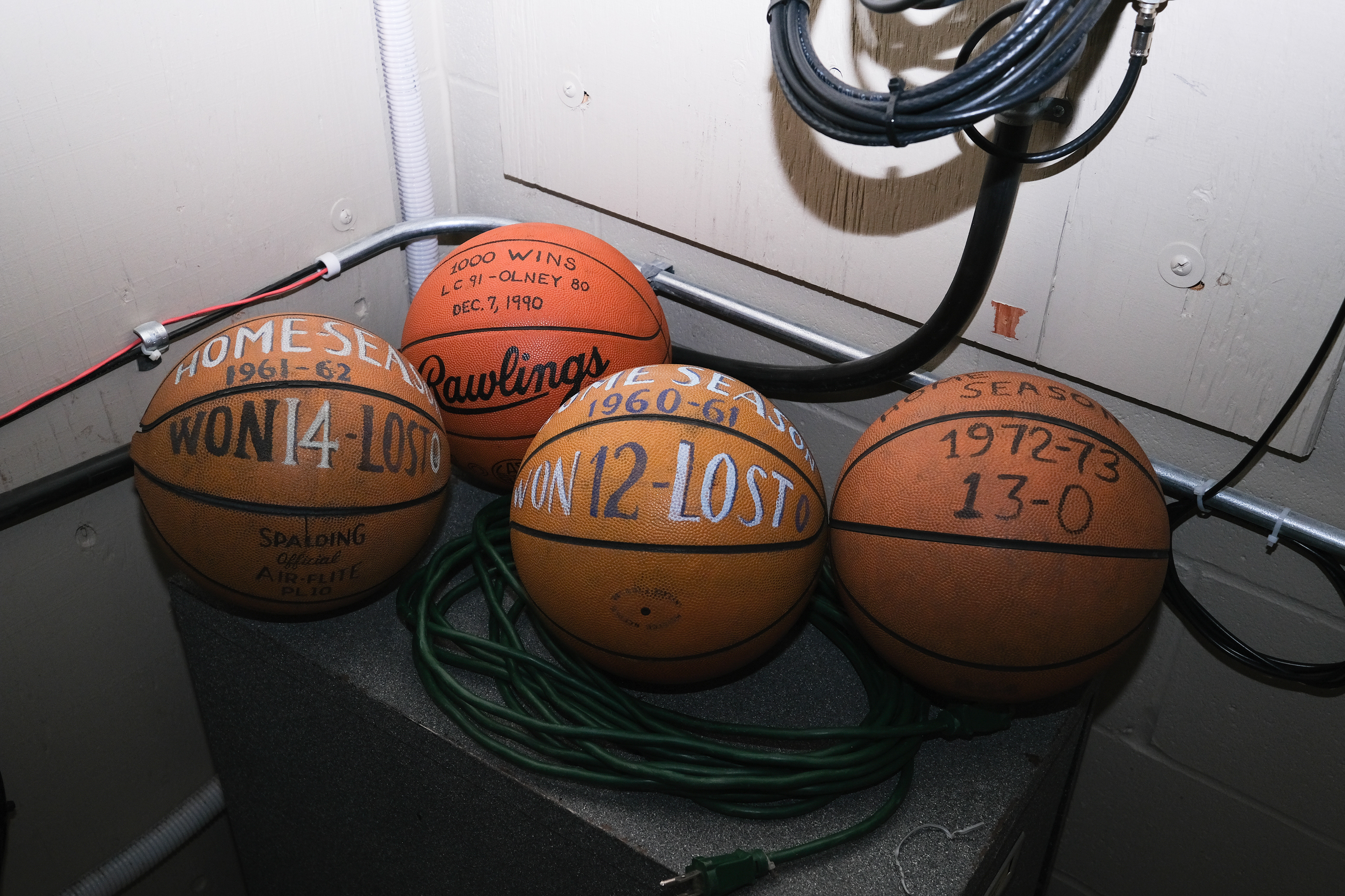 Historic championship basketballs in the back of the Lincoln Center.