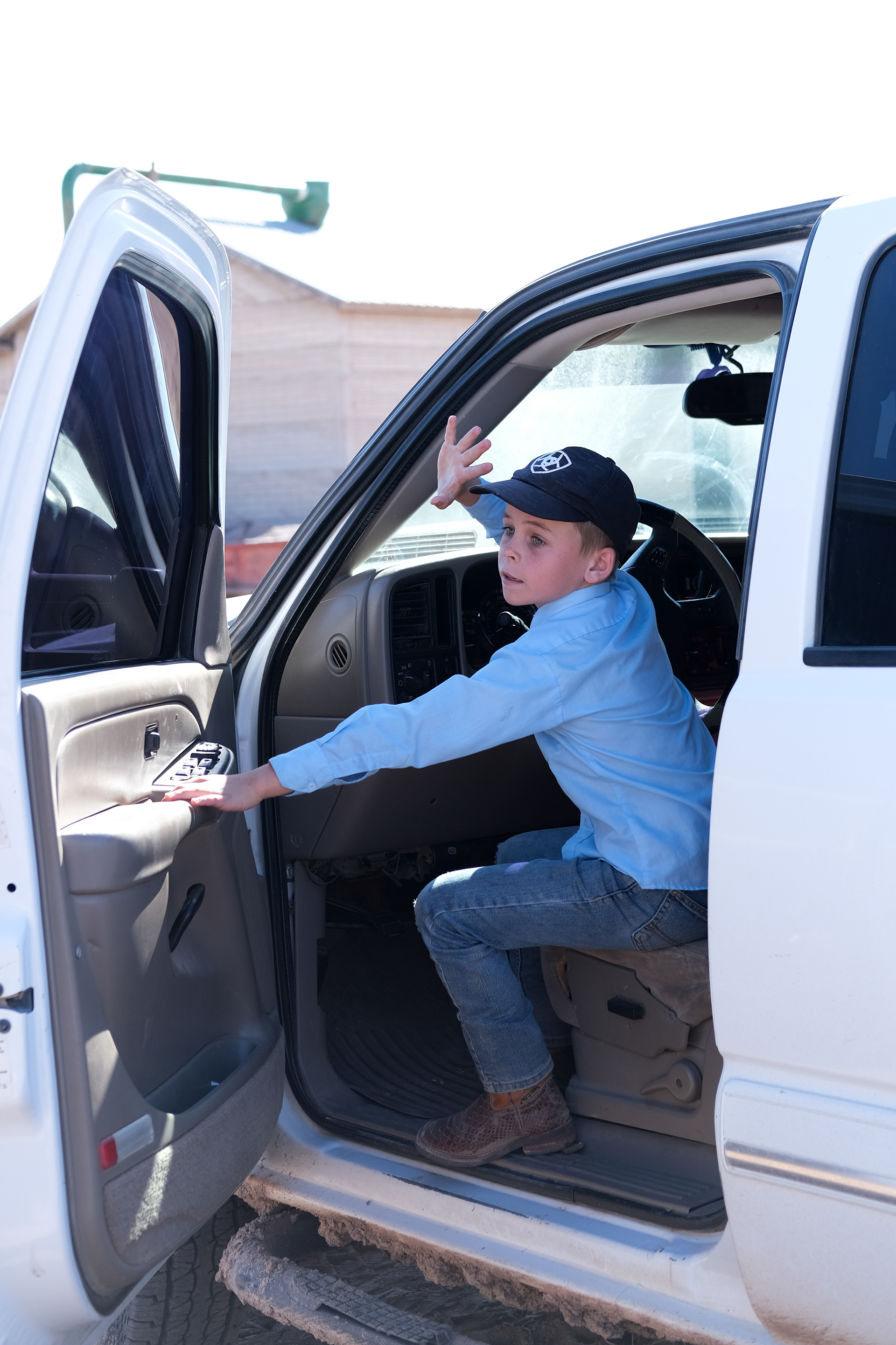 A mennonite boy driving his family's truck. Sabinal, Chihuahua