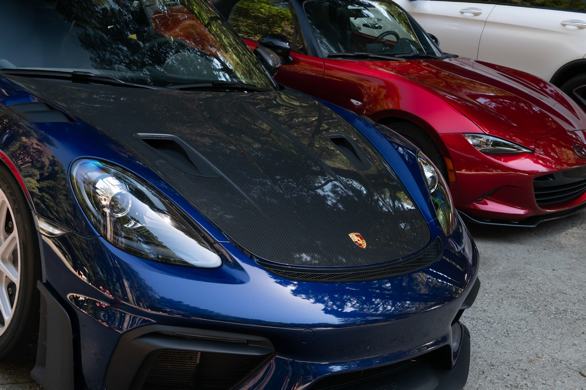 Porsche GT4RS, Mazda Miata