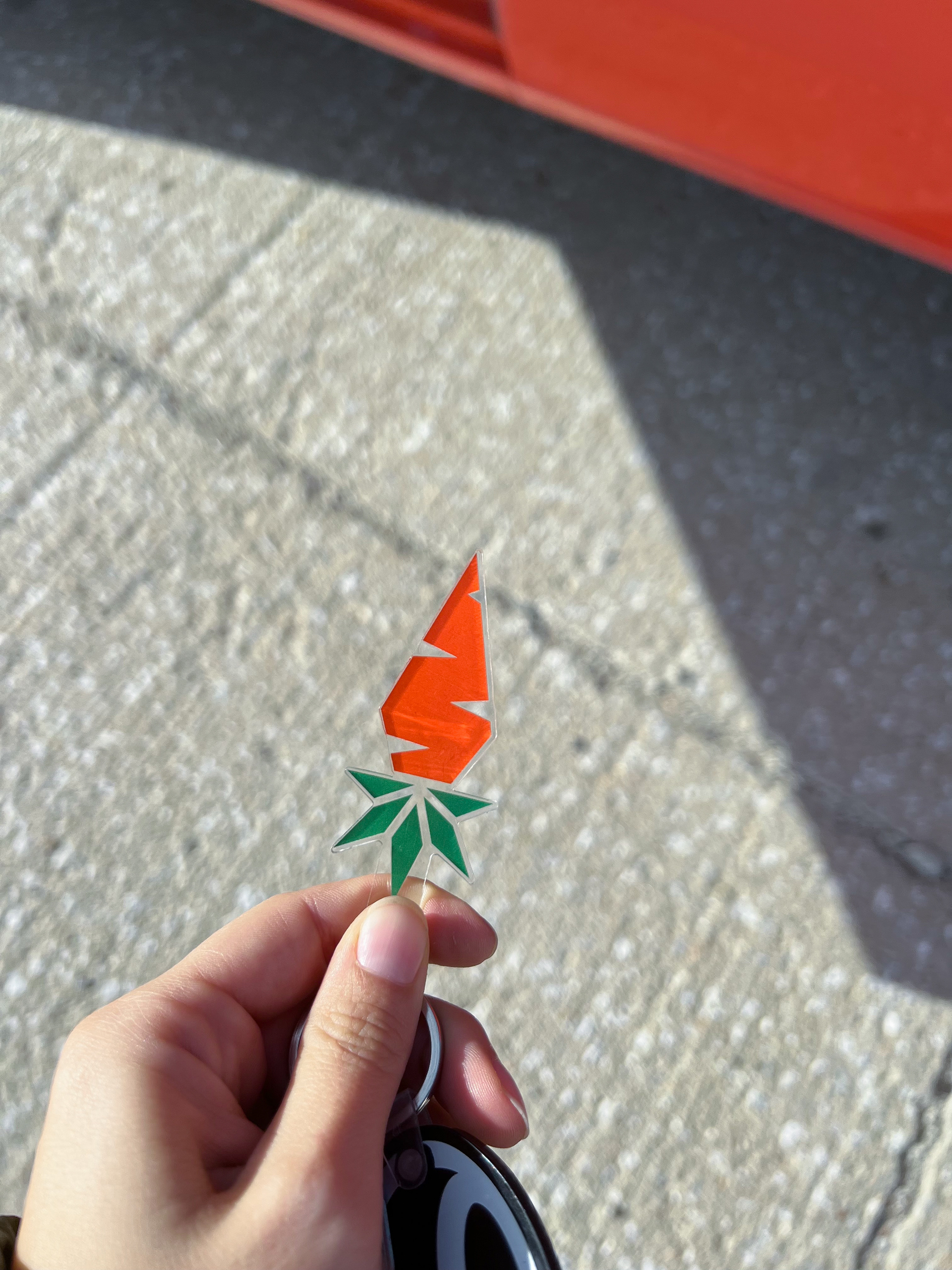 Logo mark keychain (acrylic) color matched to the company's truck