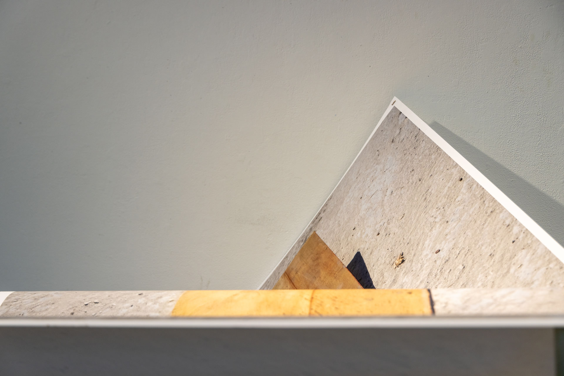 You feel misaligned; therefore you are stood on a slant, 60x40in inkjet print, found kitchen table legs, 2024