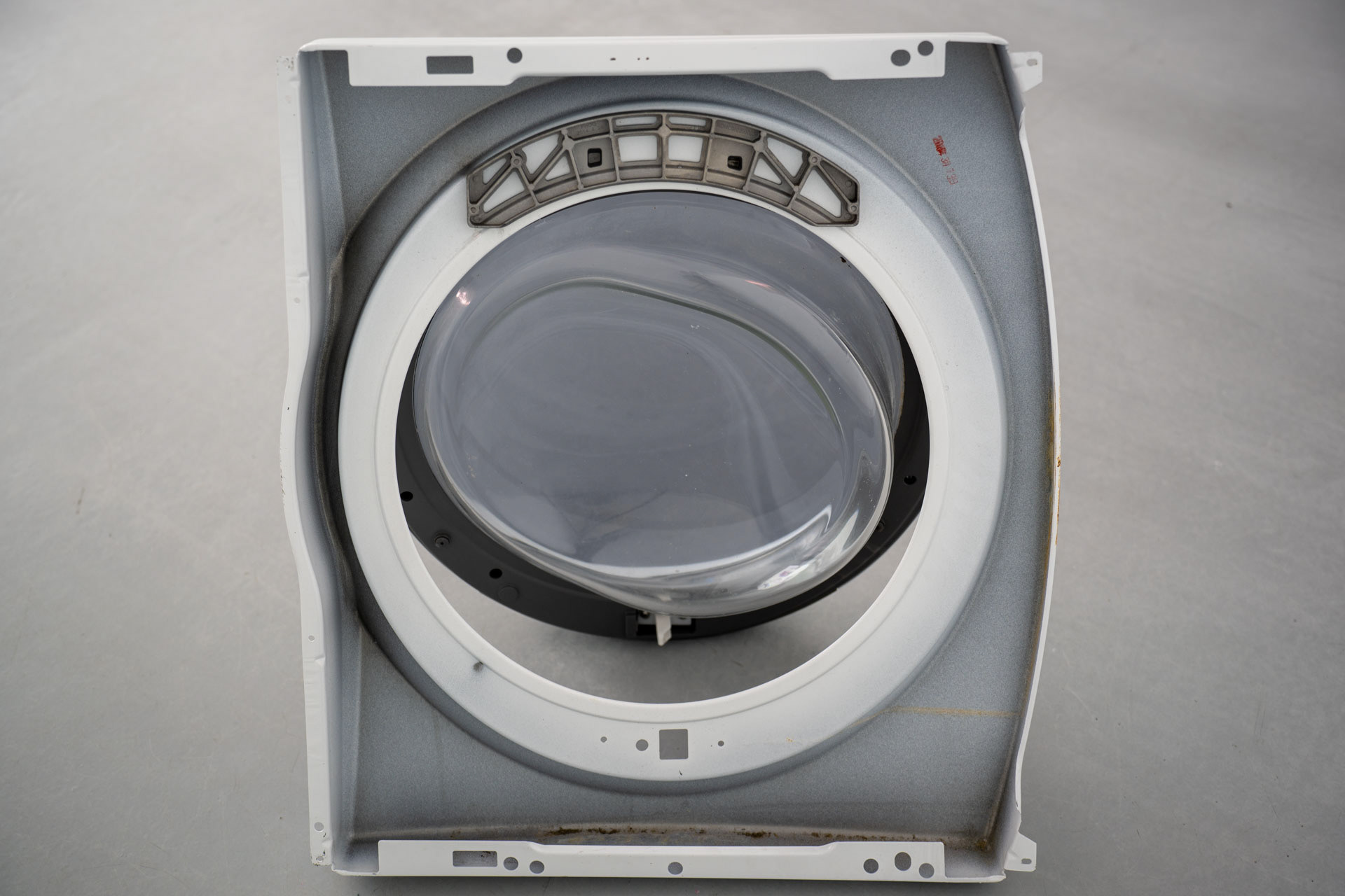 Container for Irresolution, found washer lid, 2024
