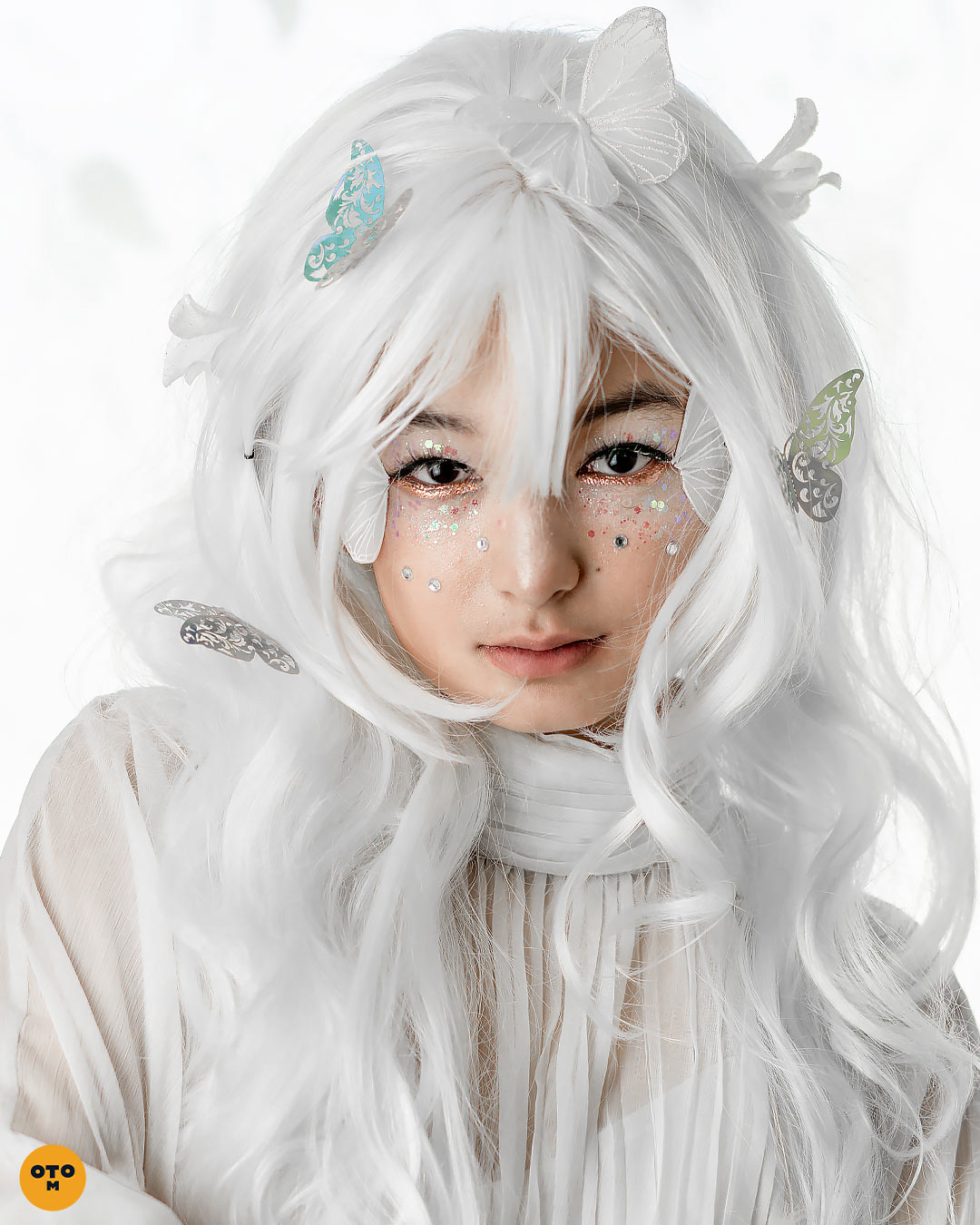 Creative white, butterfly fashion portrait photoshoot by photographer otrominuto. A part of his Prismo Photo Series.