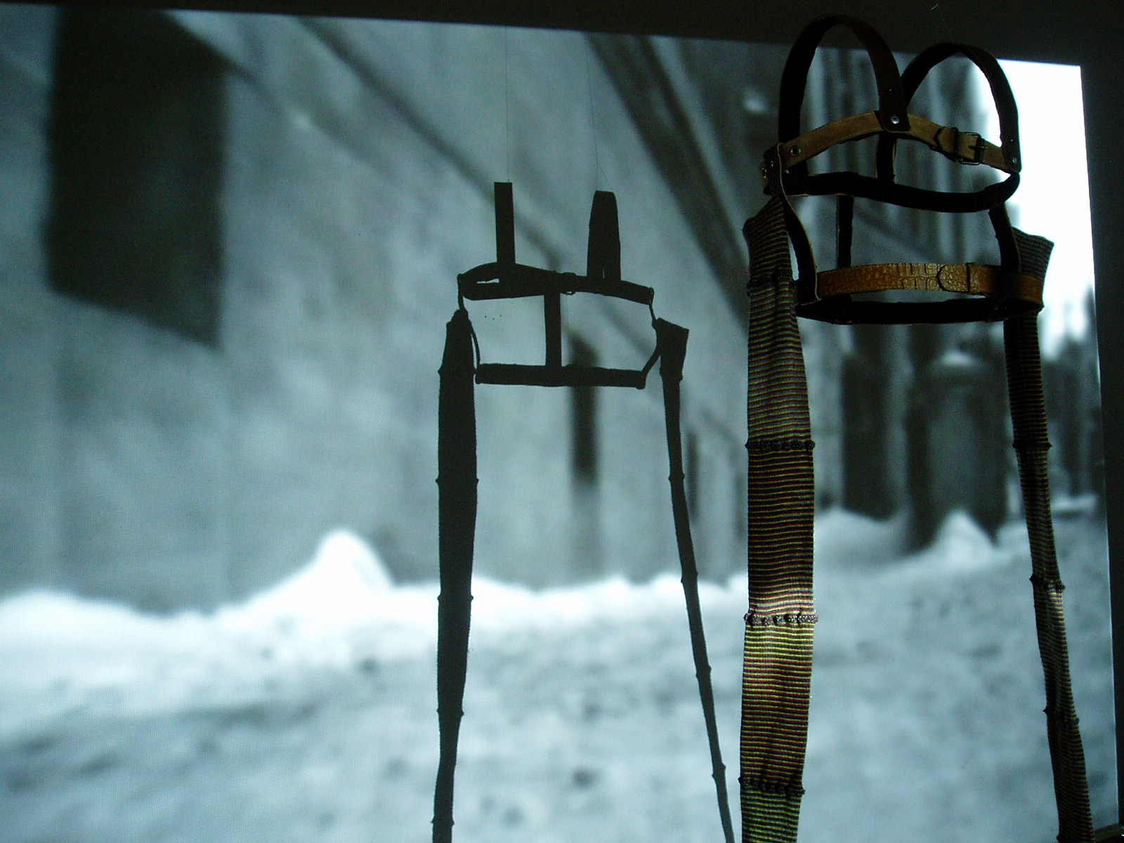 Sleeves. 1999. looped video projection, sound, sculptural object.