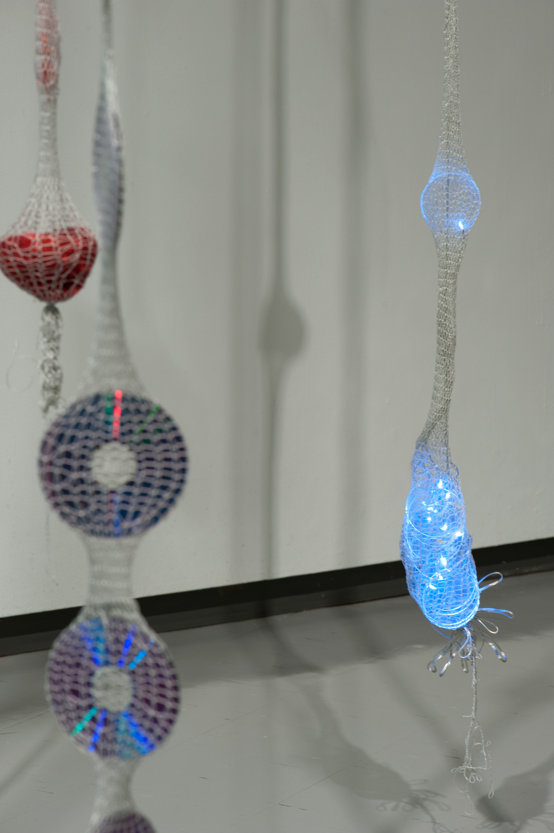Mechatronic Magpie. 2011. knitted tubes, assorted electronics, clock radios, joysticks, cds