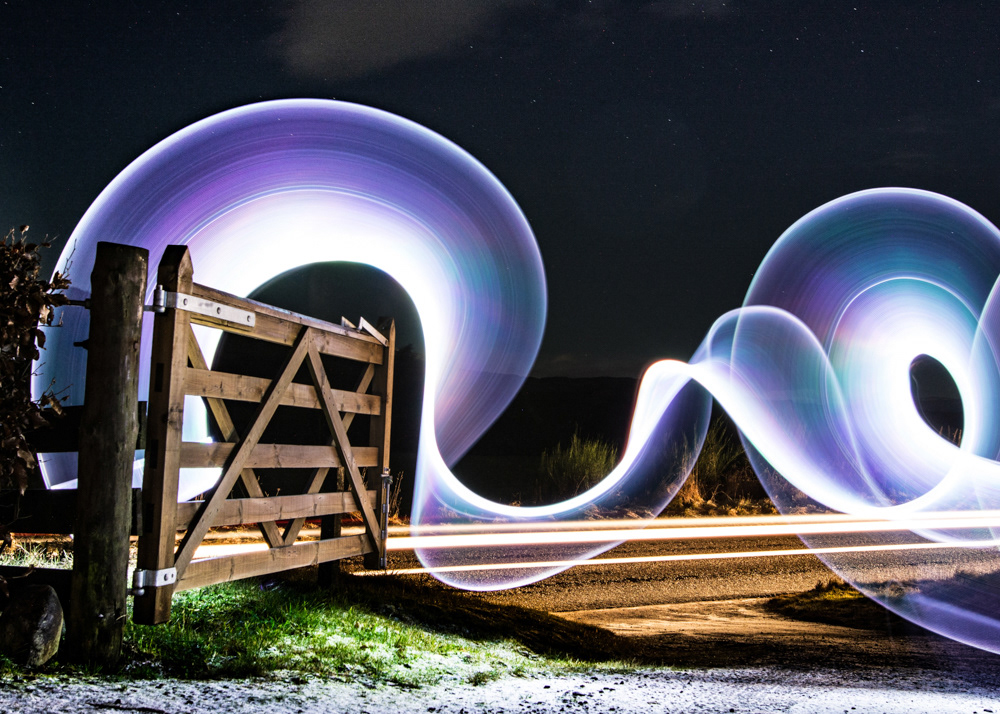 Homemade lightwand and a passing car for light trails