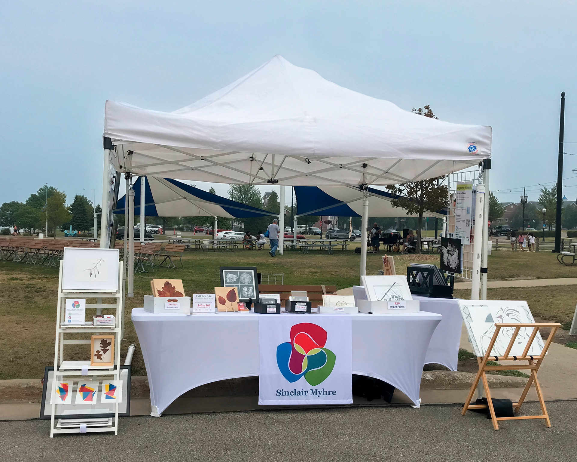 Creative Sinclair art fair farmers market booth display