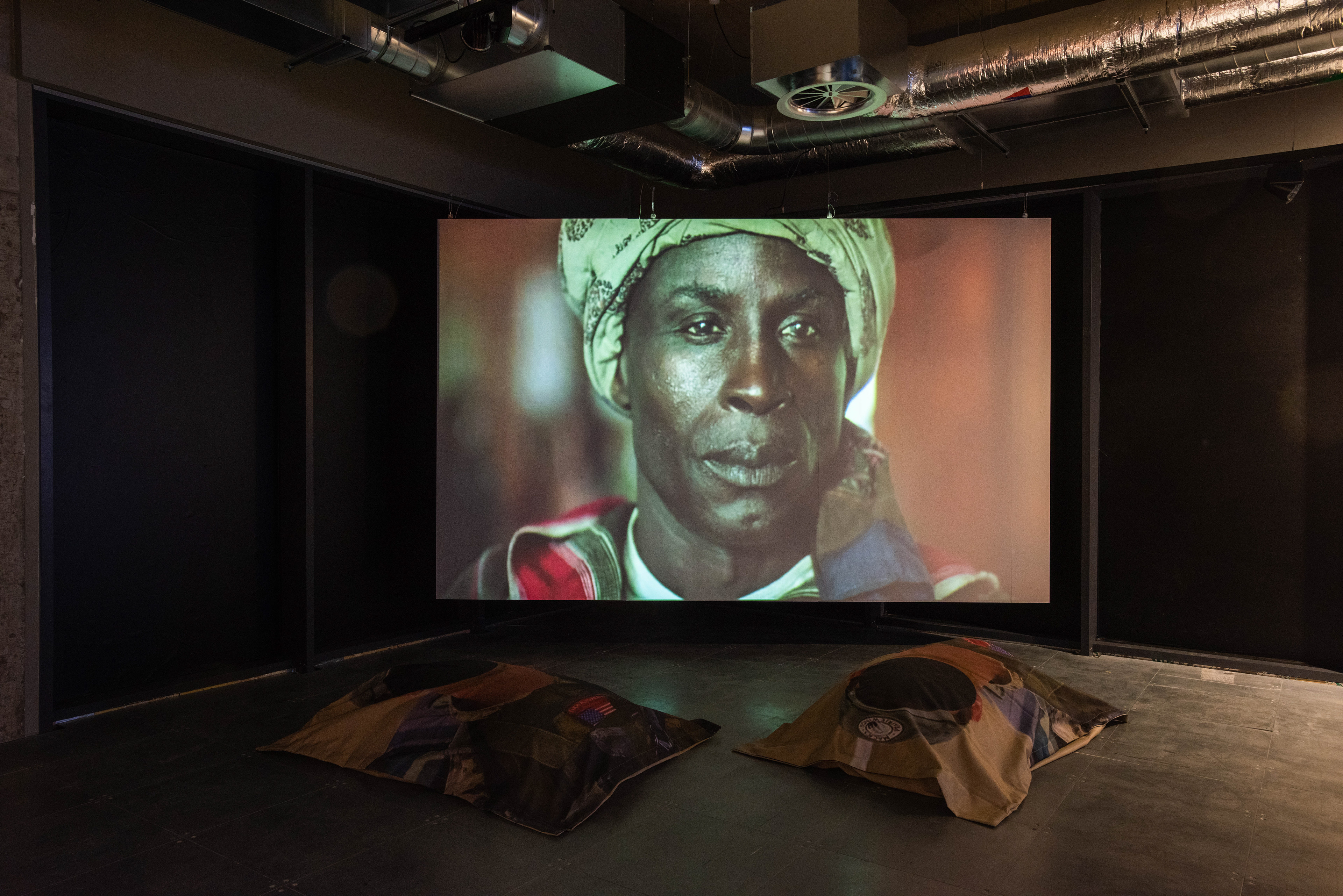 Installation view of POWERPLAY at arebyte Gallery, 2020. Featuring works by Mr Color, Bolatito Aderemi Ibitola, Vincent Bezuidenhout, Scumboy, King Debs, Mbakisi Sibanda, Kumbirai Makumbe, and Isaac Kariuki. Image: Max Colson.
