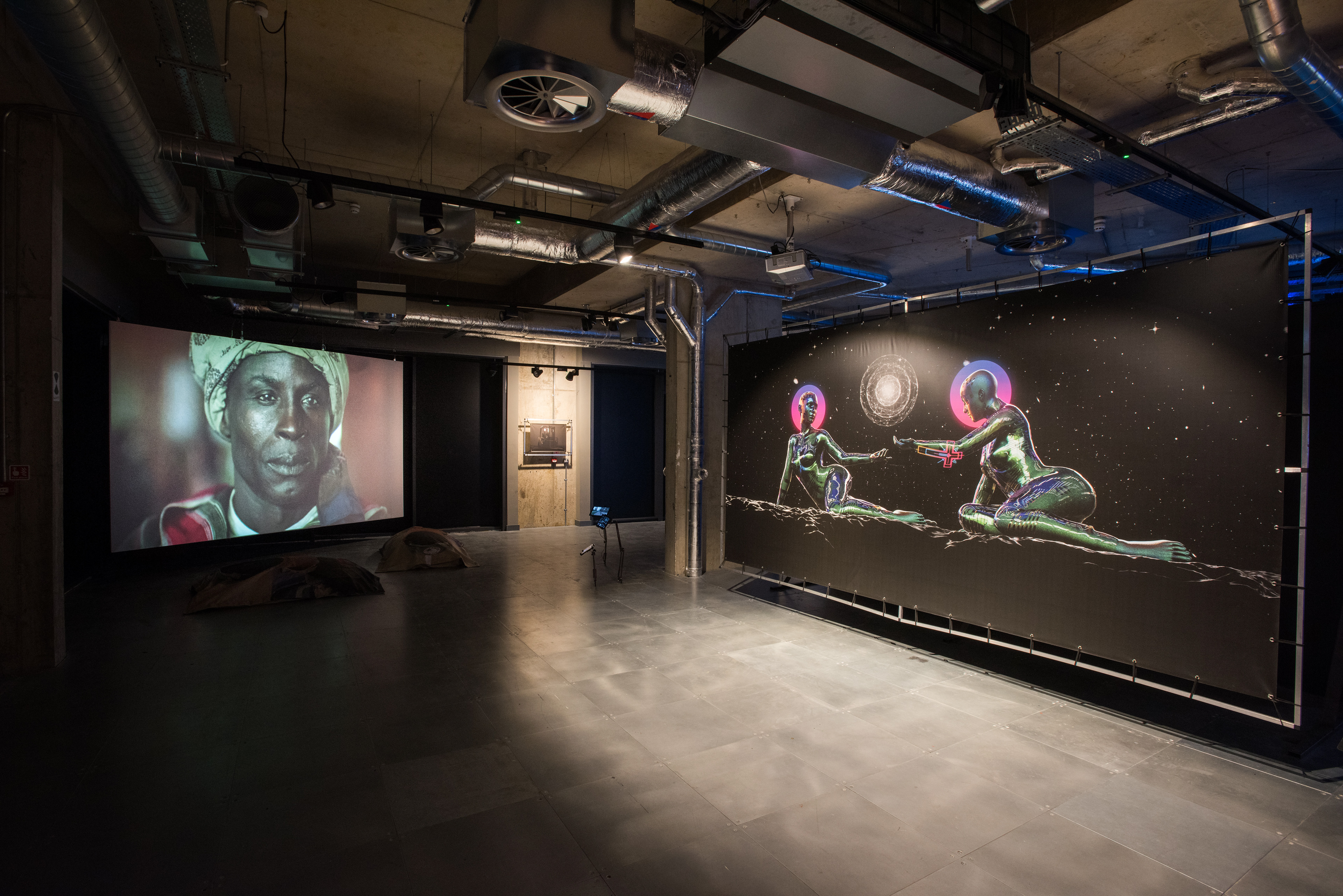 Installation view of POWERPLAY at arebyte Gallery, 2020. Featuring works by Mr Color, Bolatito Aderemi Ibitola, Vincent Bezuidenhout, Scumboy, King Debs, Mbakisi Sibanda, Kumbirai Makumbe, and Isaac Kariuki. Image: Max Colson.
