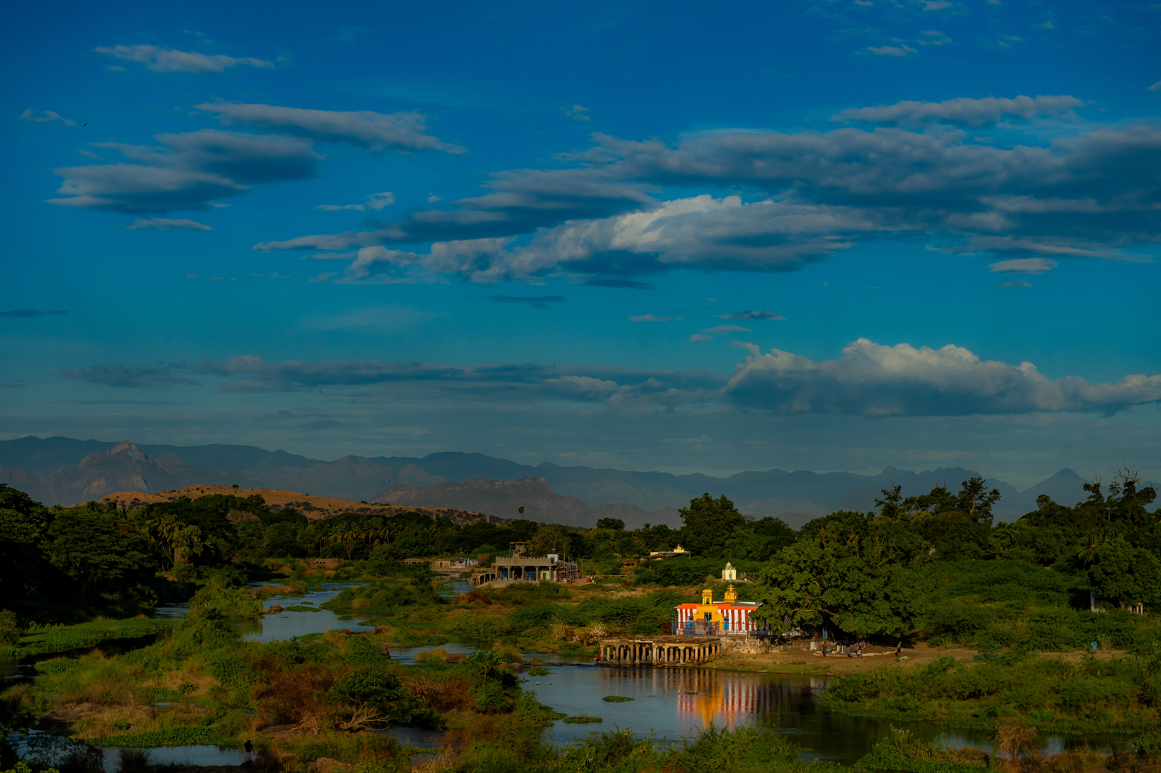 Sri Subramania Swamy Temple a temple to Lord Murugan as seen from aboard the Ananthapuri Express as it crosses the Thamirabarani river.