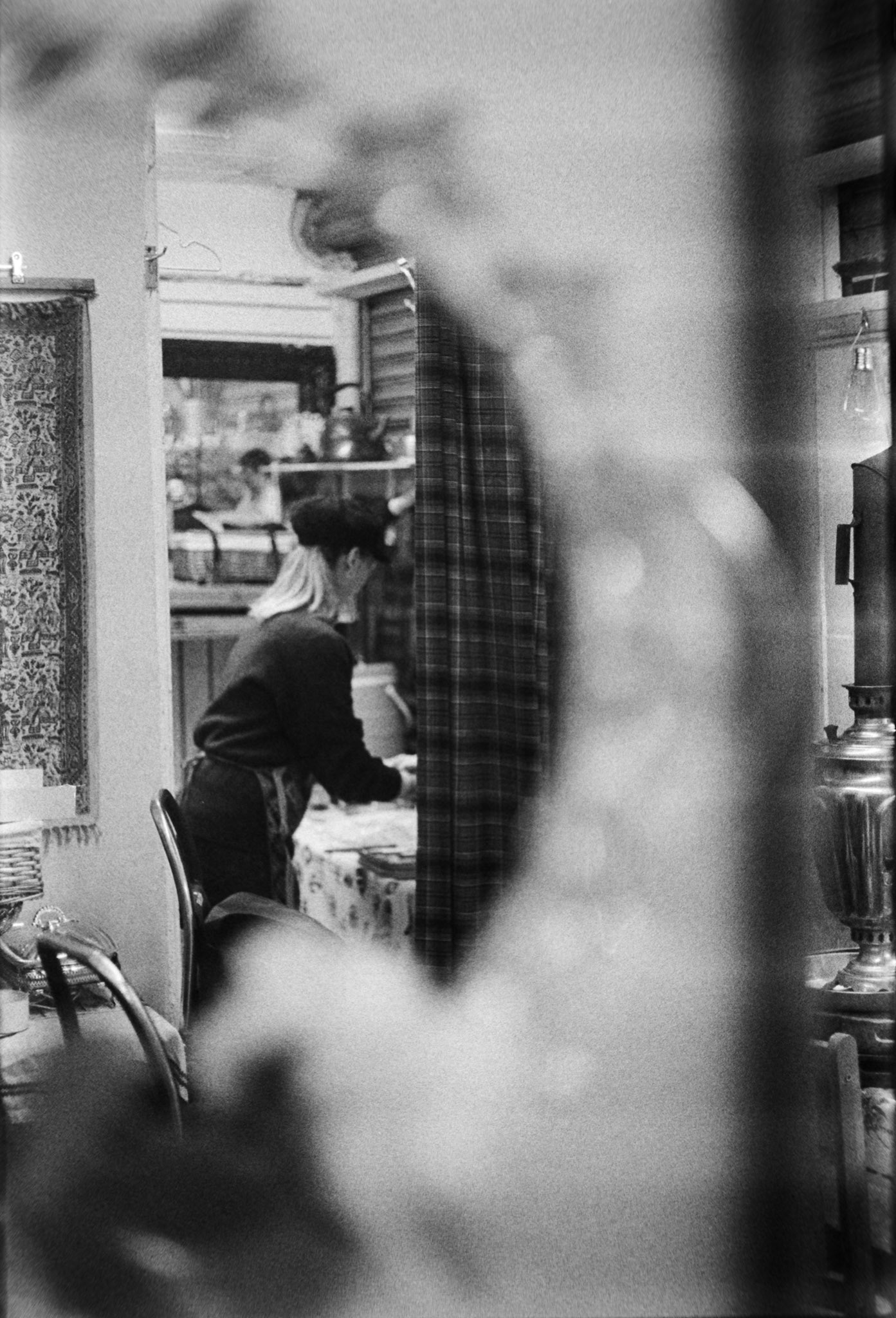 Svitlana prepares food in the kitchen