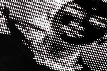 Vinyl stencil used to preserve halftone detail during blasting.