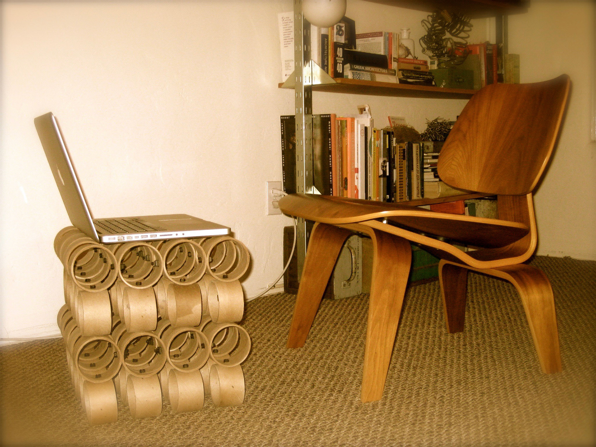 12 ½” x 12 ½” x 2 ½” cardboard, black iron nuts & bolts,