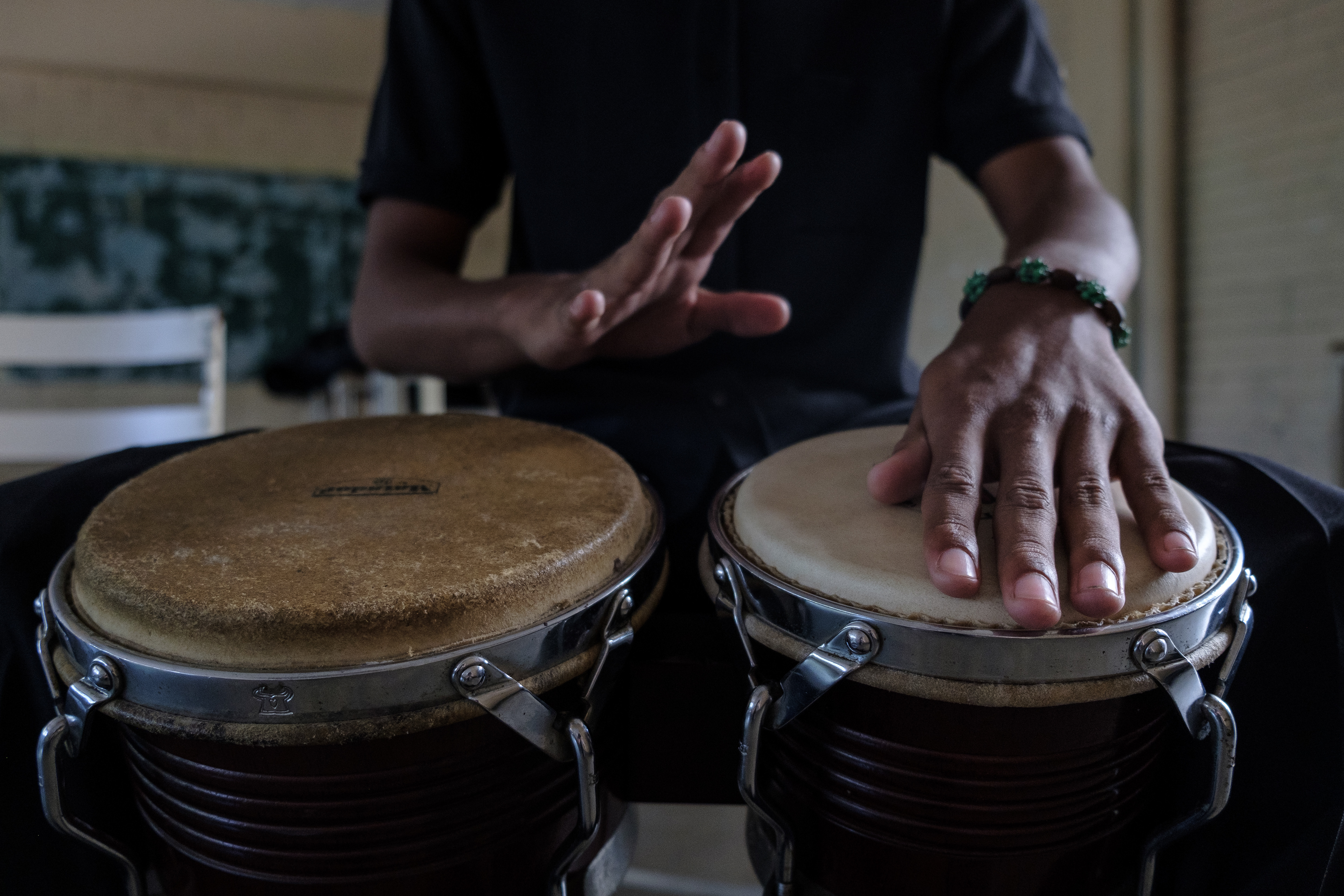 Cherart Rodriguez learning how to play the bongos. Caracas, April 6, 2019
