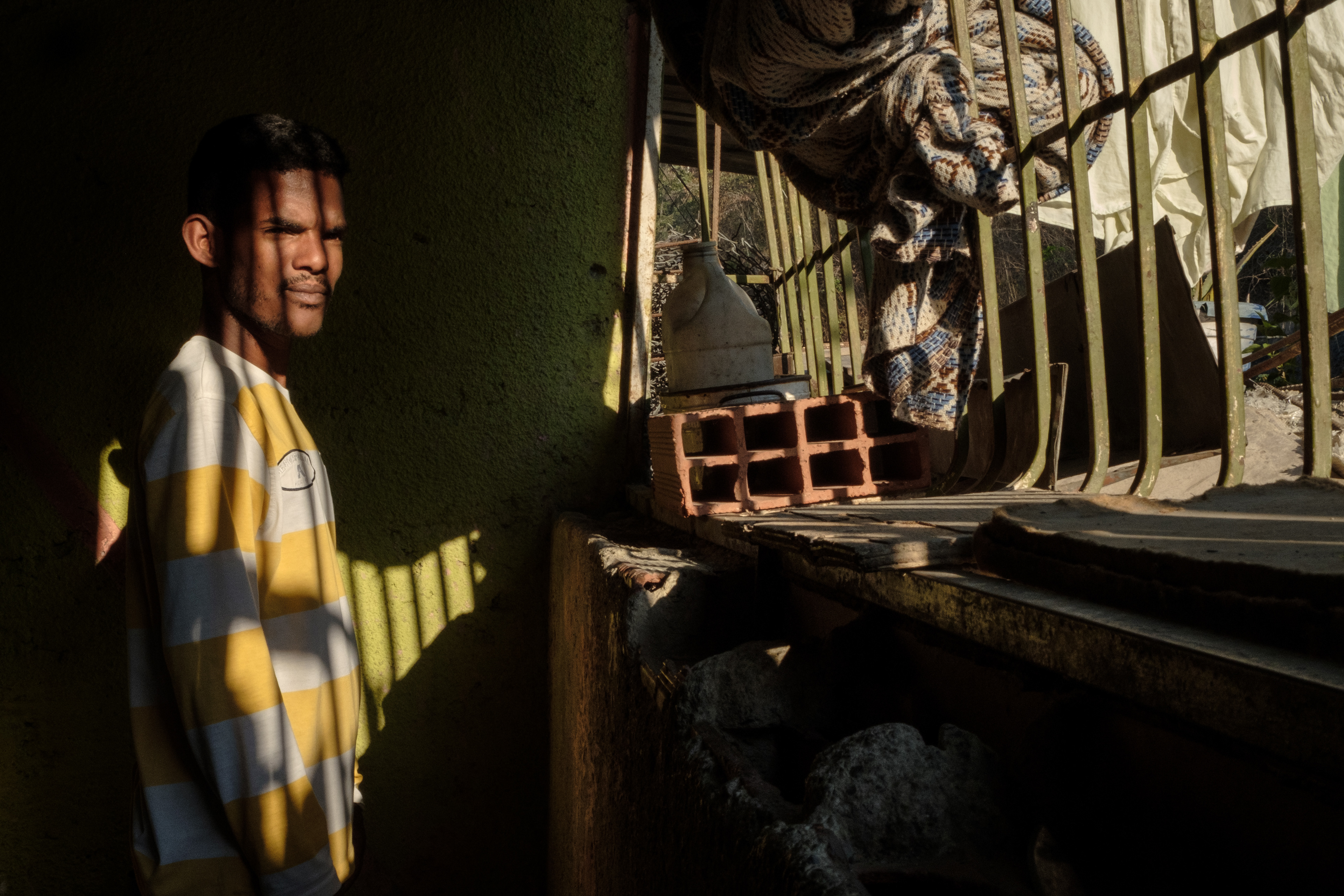 Duglas Alexander Mendoza, poses for a portrait in his house in San Isidro, Petare. This Neighborhood is one of the poorest and most dangerous areas of Caracas. April 5, 2019