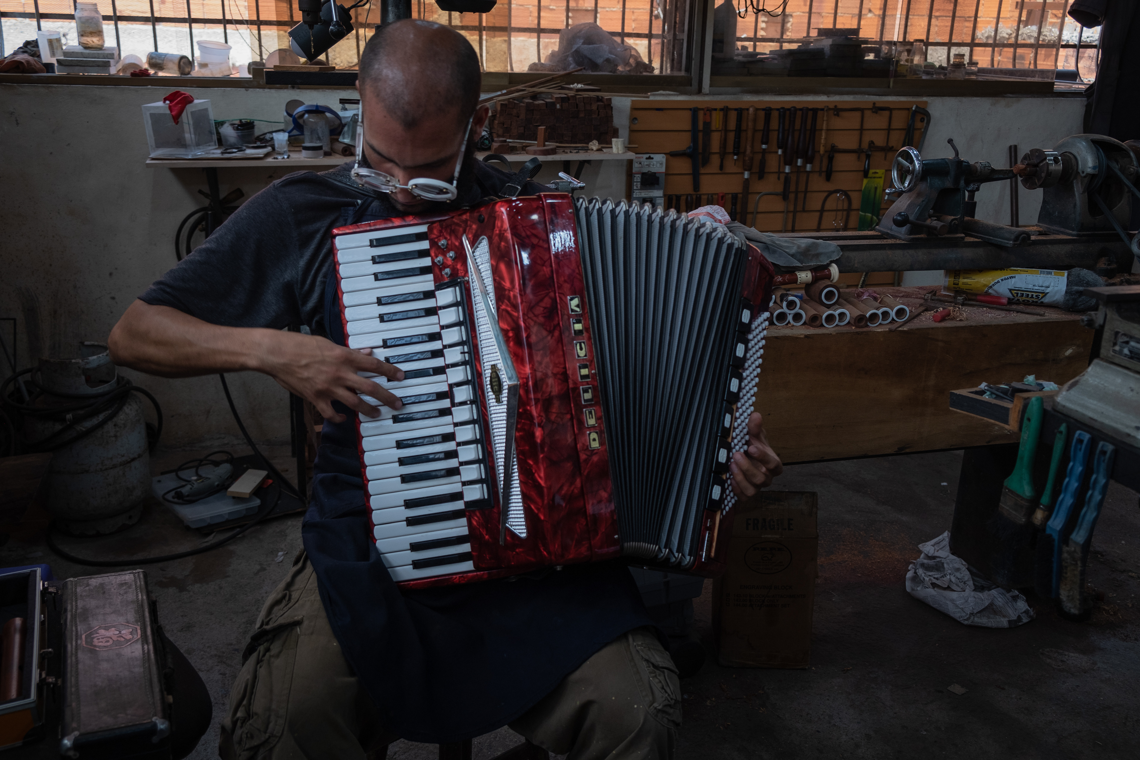 Antonio Braiz wanted to learn accordion. He found this one at a store, very cheap because it was damaged but he managed to fix it. The price for one like this in optimal conditions would be around the thousands of dollars. Caracas March 19, 2019.