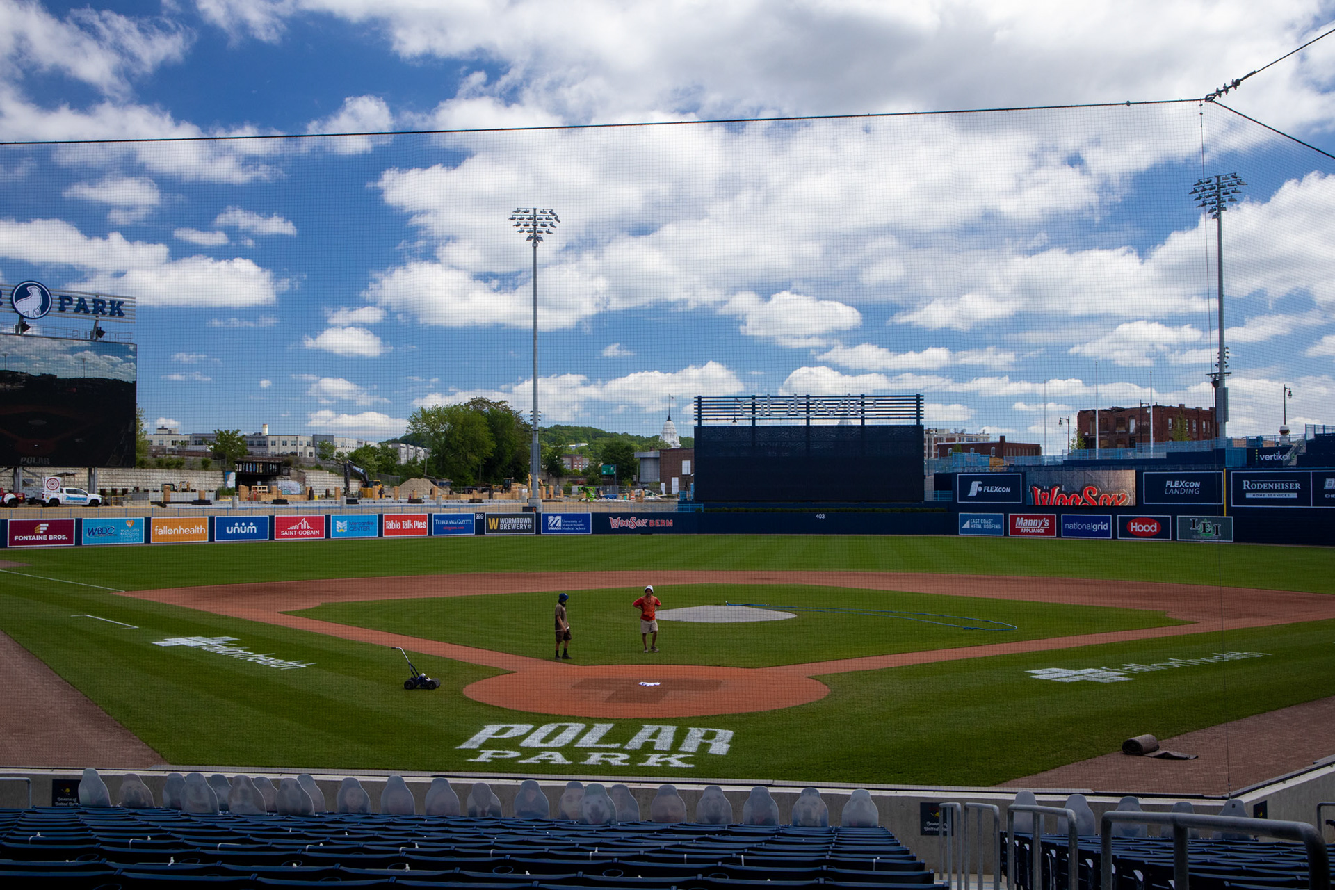 Two grounds crew for the Worcester Red Sox take a quick break from preparing the field. June 2021