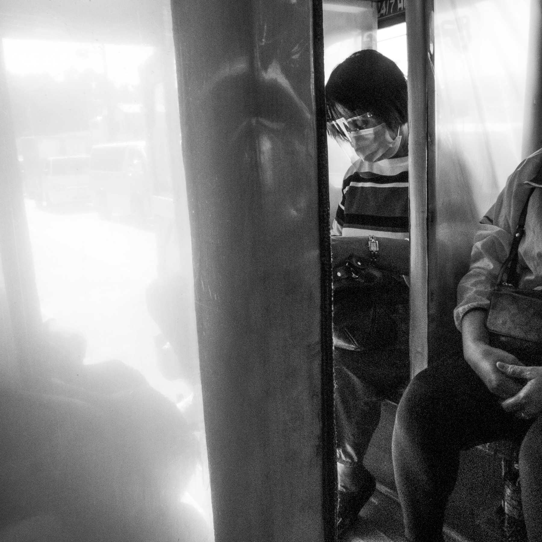 Buhay pasahero, behind the cellophane. Lumix LX5.