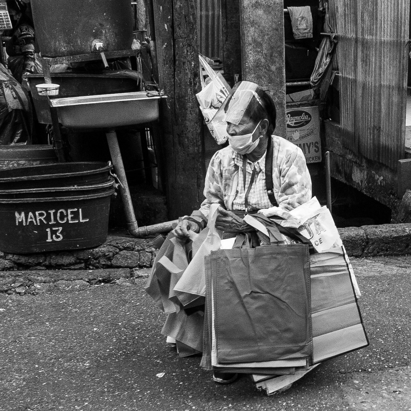 Bag vendor at the marketplace. Lumix LX5. 