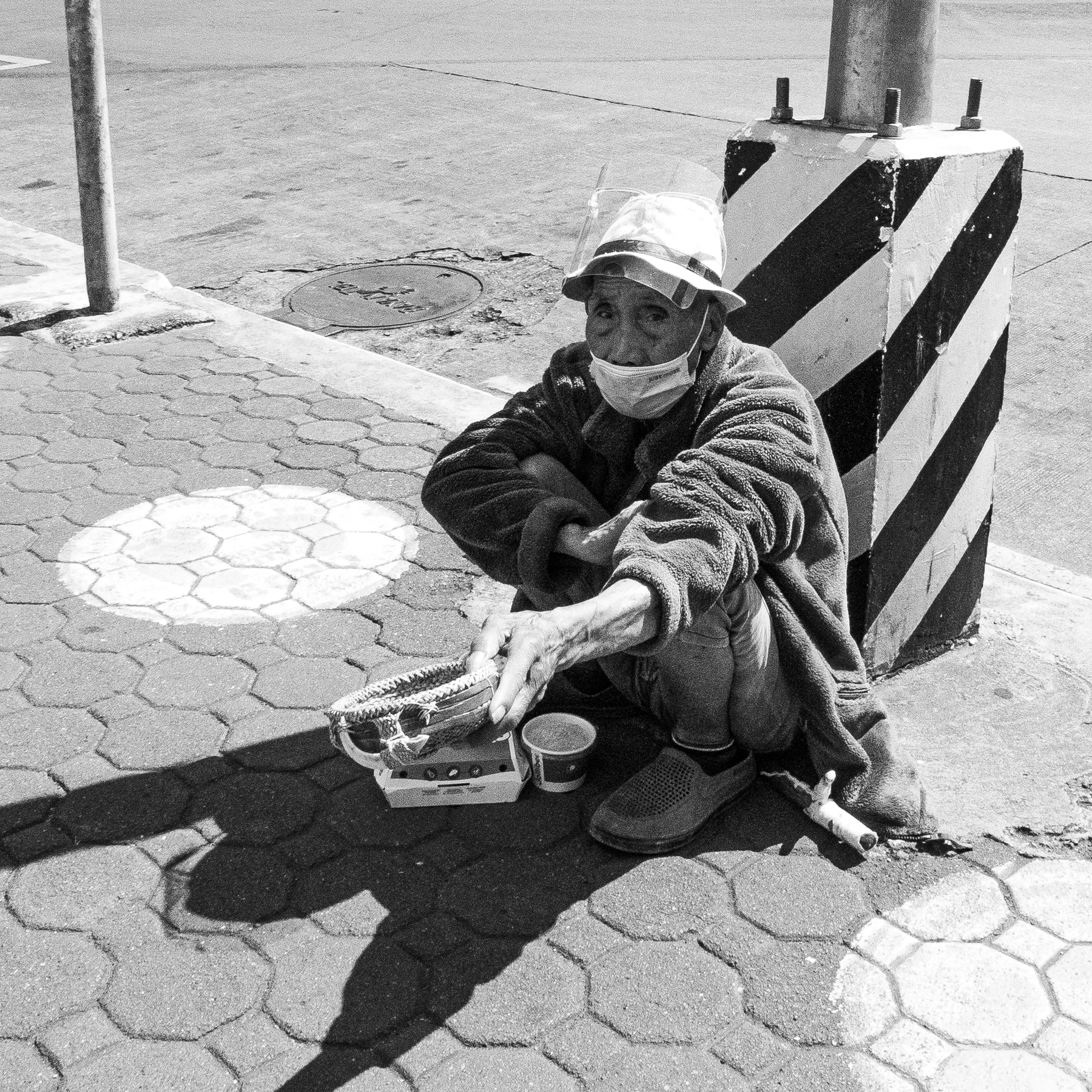 Poor man with KFC treat. Lumix LX5.