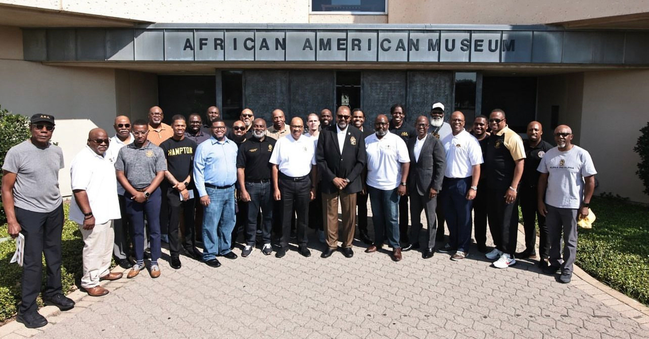 Bro. Cattouse with the Fraternity's Executive Board in front of the Dallas African American Museum