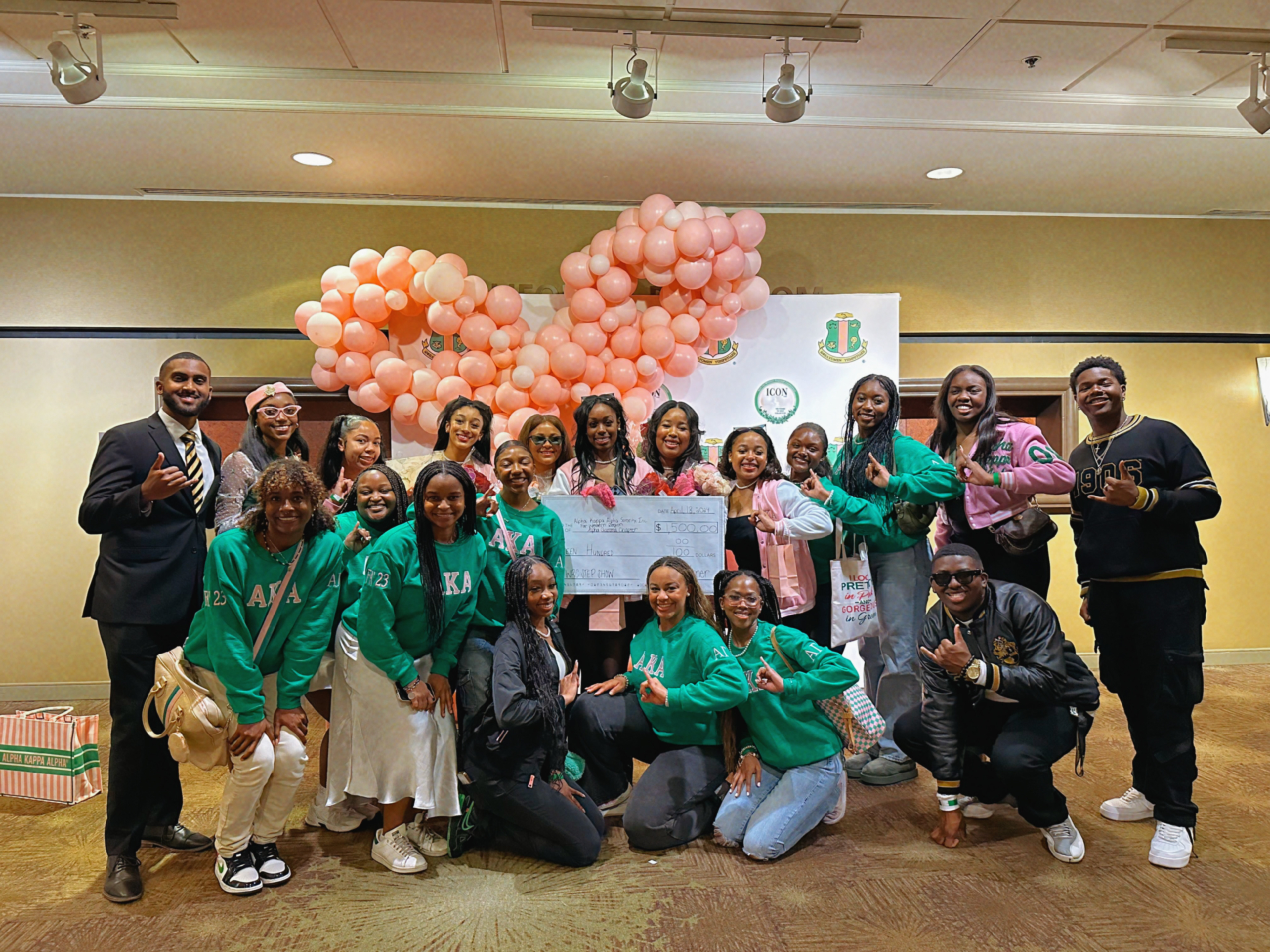 Brothers supporting the Alpha Gamma Chapter of Alpha Kappa Alpha Sorority Inc. at their convention step show