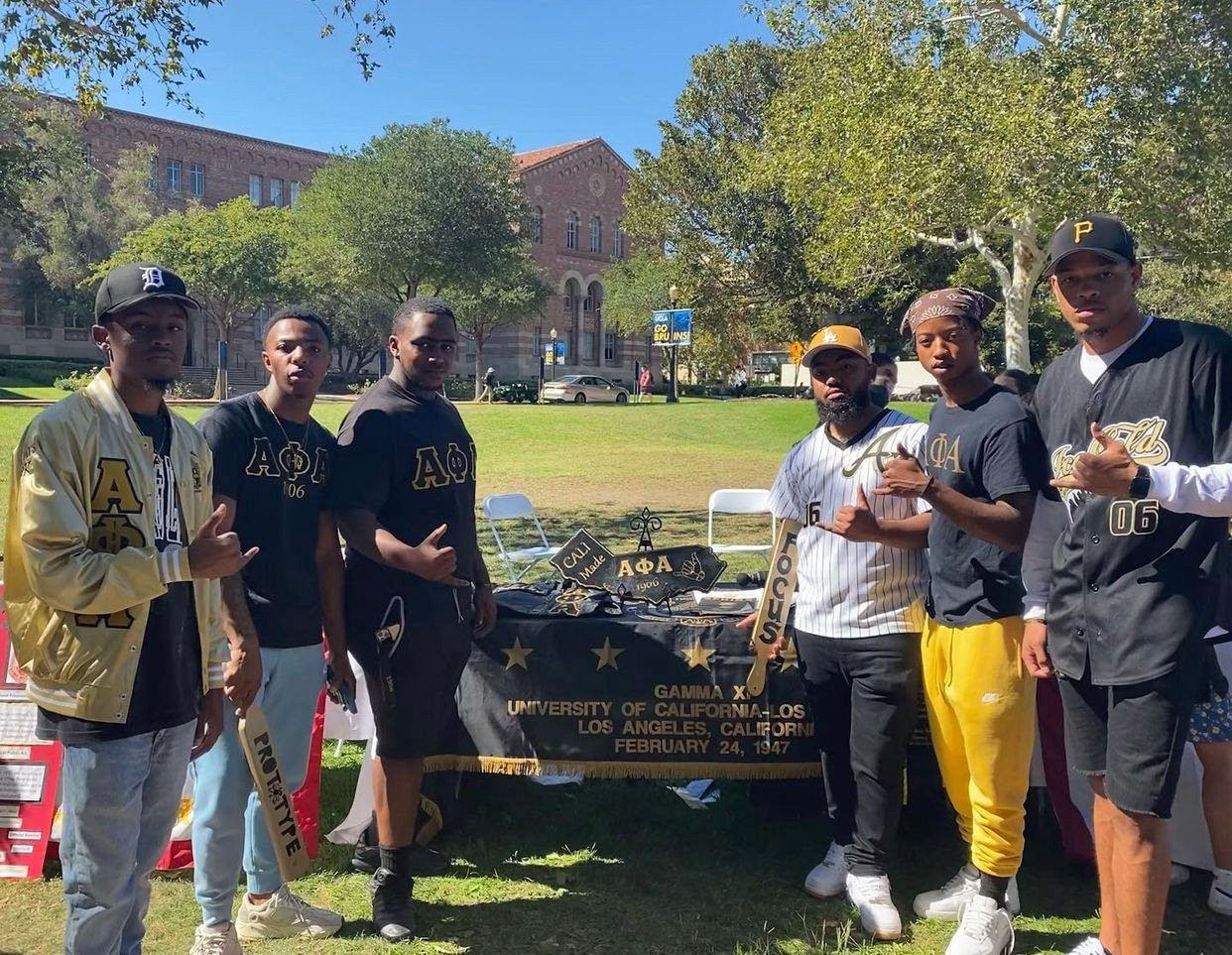Brothers Remy, Moore, and Lewis (ΠΚ) tabling at UCLA Enormous Activities Fair with Brothers Cattouse, Bryant and Mays (ΜΧ).