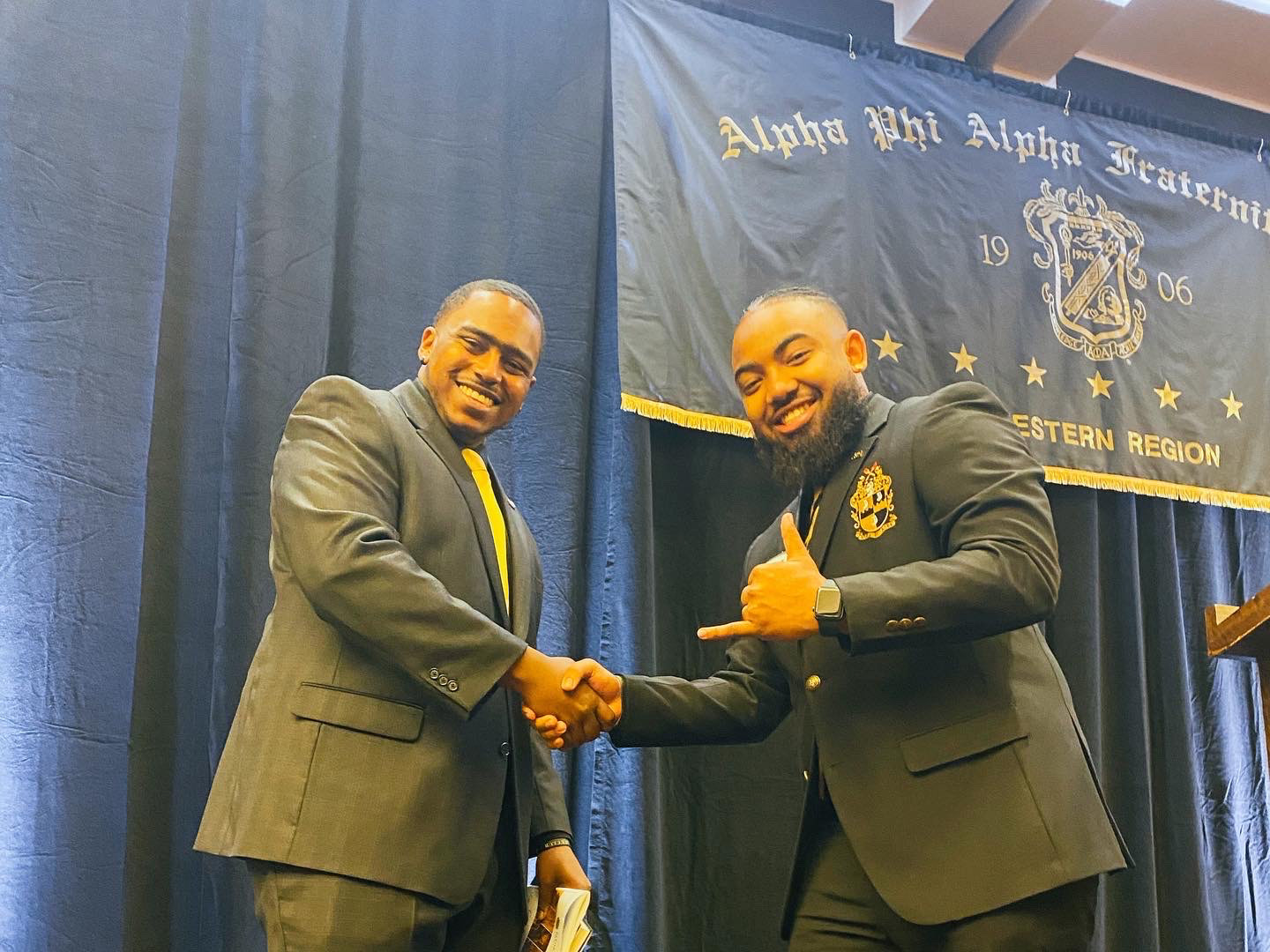 Brother Western Region Assistant Vice President Derrick Lewis (ΠΚ) with Brother Cattouse at the 73rd Western Regional Convention 