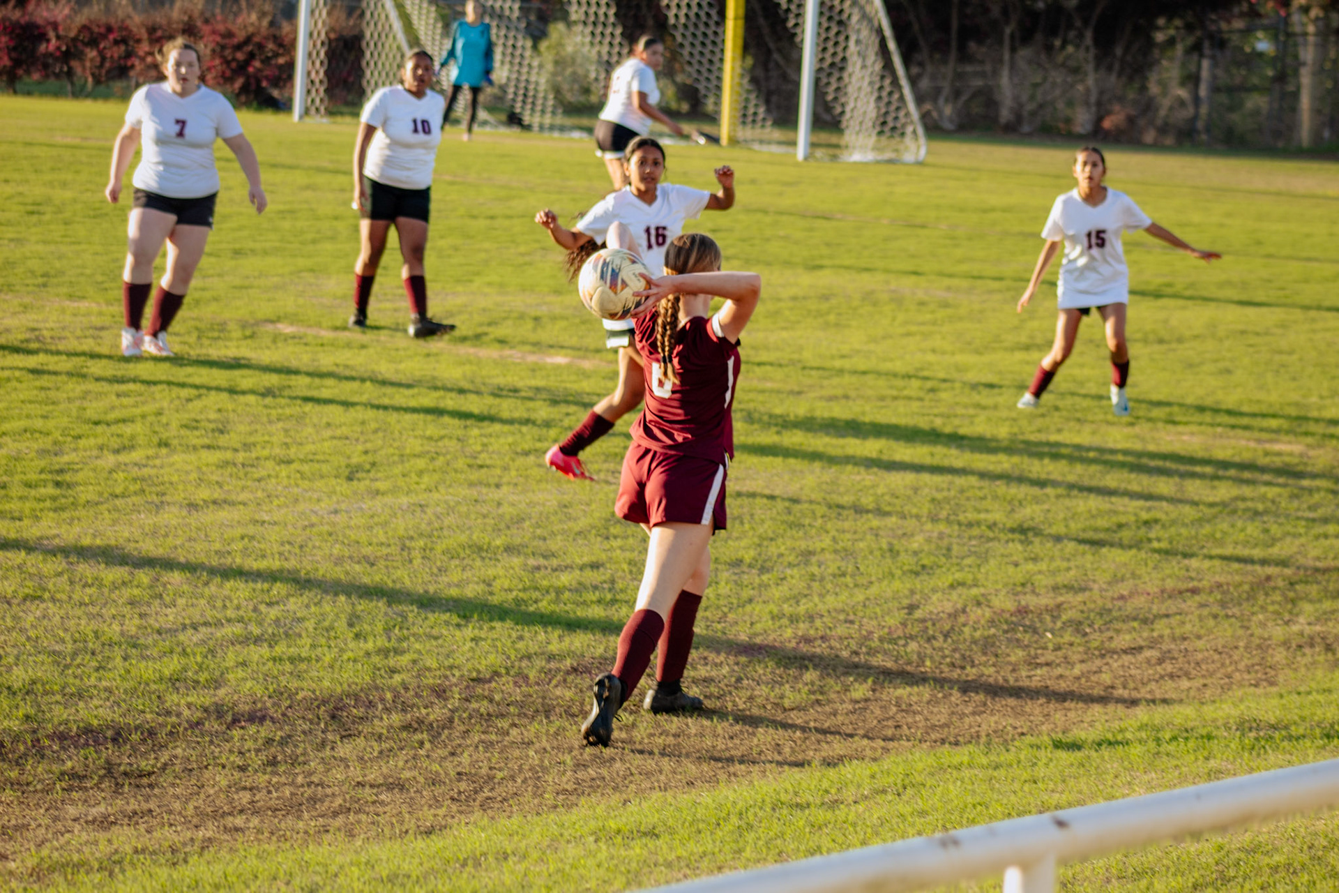 #6 Kacee Esco throwing in a ball during a match aganist Pelion