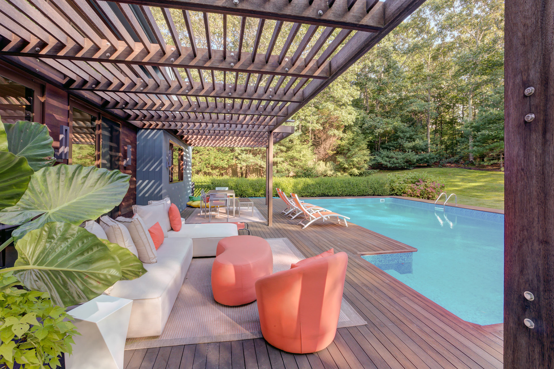 Modern backyard with wood trellis and pool