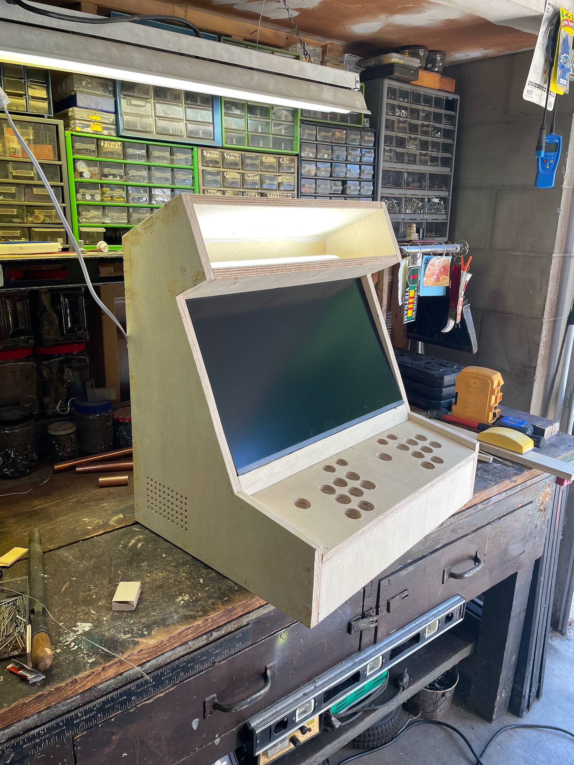 Marquee and control panel. Monitor was installed to test the support beam above the control panel.