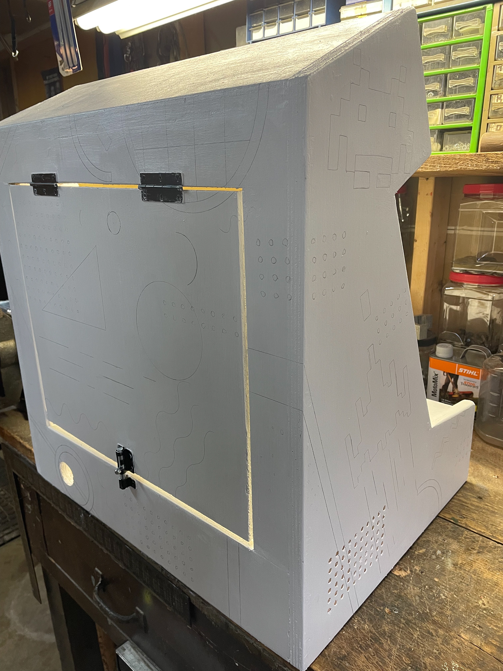 Rear of cabinet. If you look closely, you can see sketches of the characters penciled in.