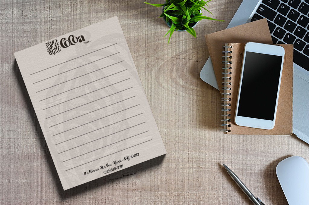 Notepad. Just like the contact sheet, I kept the design subtle for the sake of readability when the guests decides to write something on it. Even with its subtlety, a slight texture and cocoa bean illustration was applied to the paper to match with our branding.