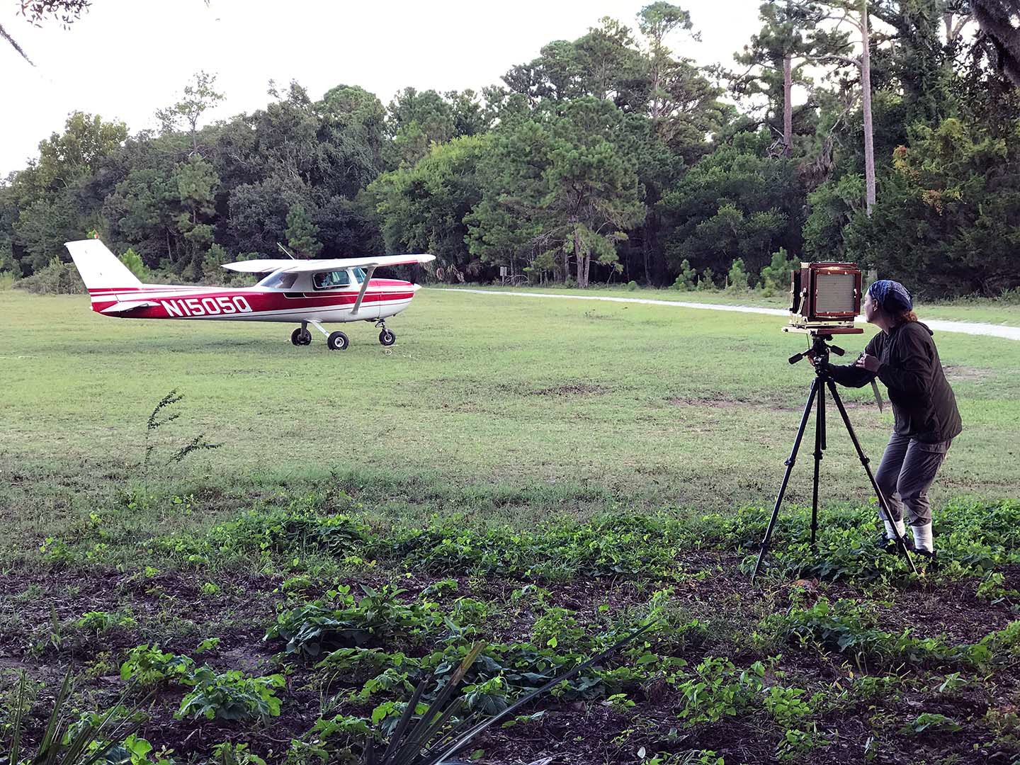 Emily photographing a plane at Stafford Field
