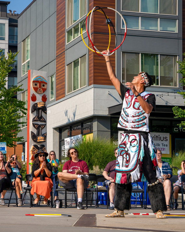 Ty Juvinels Cousin Michael Goedel performs hoop dance