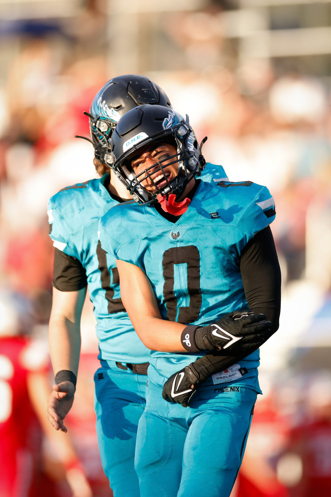 Farmington Safety Kava Fiefia (0) celebrates after making an interception in the endzone to keep the Redhawks off the board.