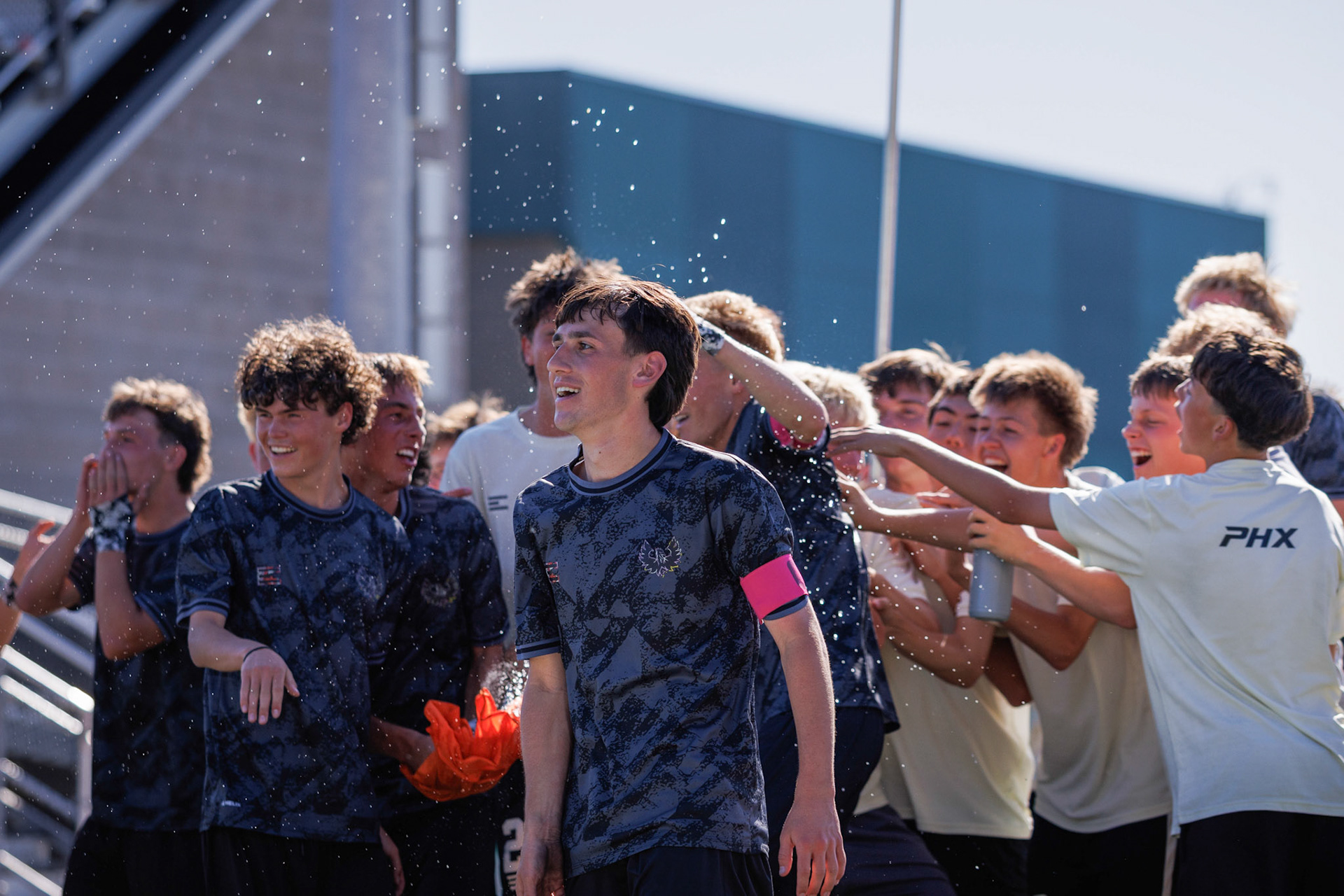 Farmington celebrates a second half goal with their sideline to go up 2-0 over American Fork in the first round of the state soccer tournament.