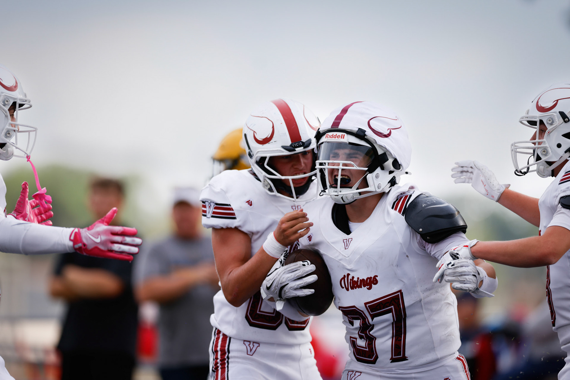 Benjo Tolman (37) celebrates a 55-yard touchdown to put Viewmont up 14-0 over Bonneville in the first quarter.