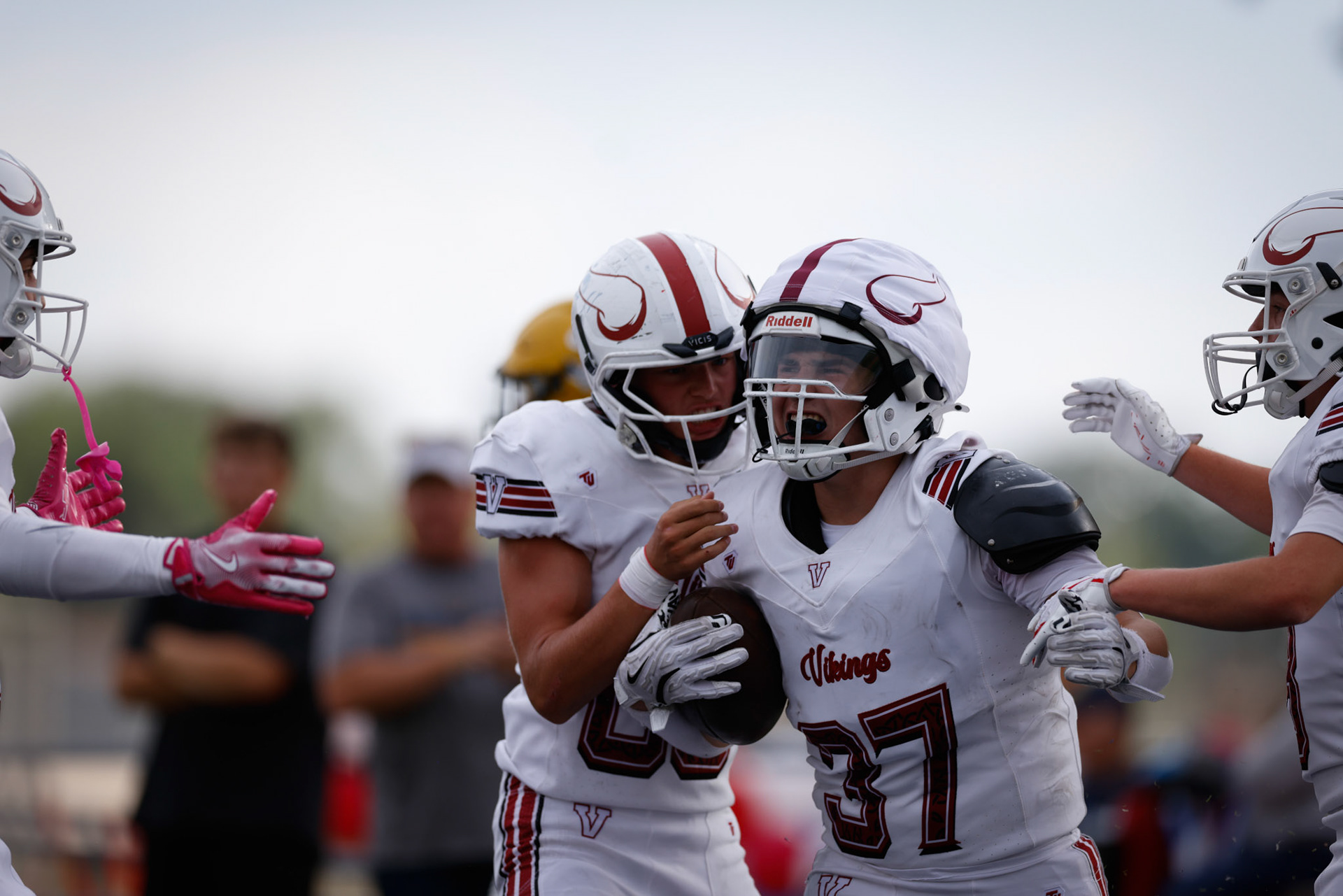 Benjo Tolman (37) celebrates a 55-yard touchdown to put Viewmont up 14-0 over Bonneville in the first quarter.