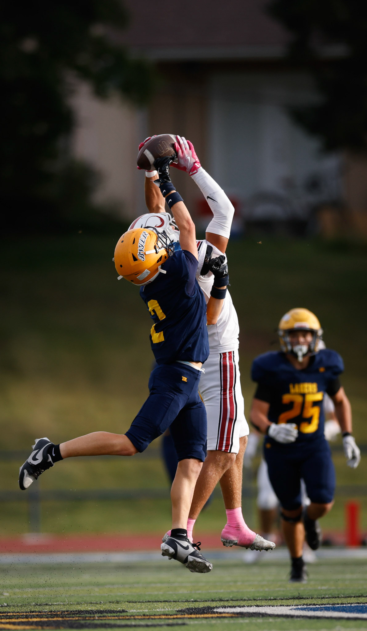 Viewmont WR Jayson Dunroe (2) catches an 85-yard touchdown pass on the first play from scrimmage for the Vikings.