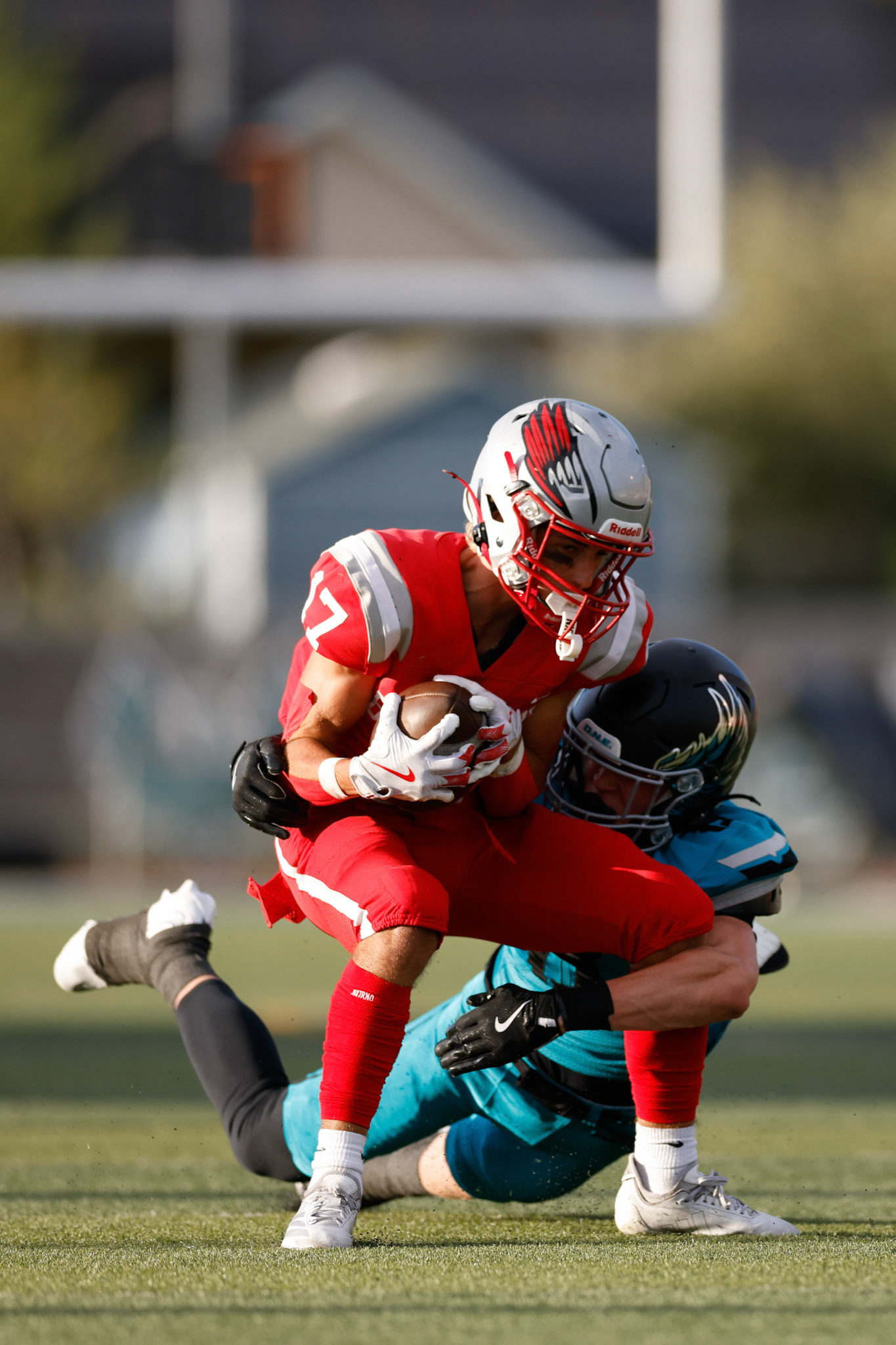Bountiful WR Max Feller (17) hauls in a catch during Bountiful's opening drive of the game.