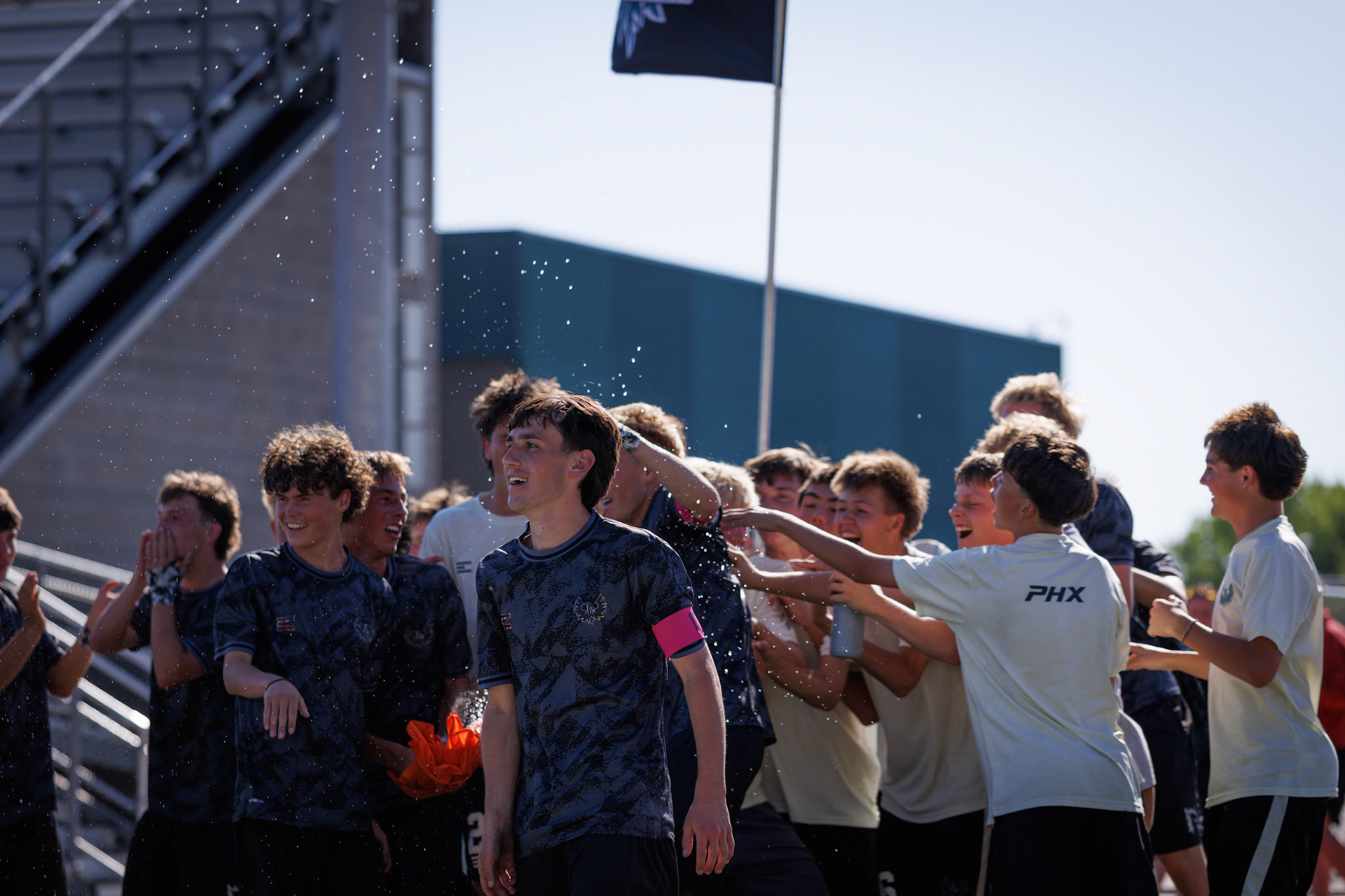 Farmington celebrates a second half goal with their sideline to go up 2-0 over American Fork in the first round of the state soccer tournament.